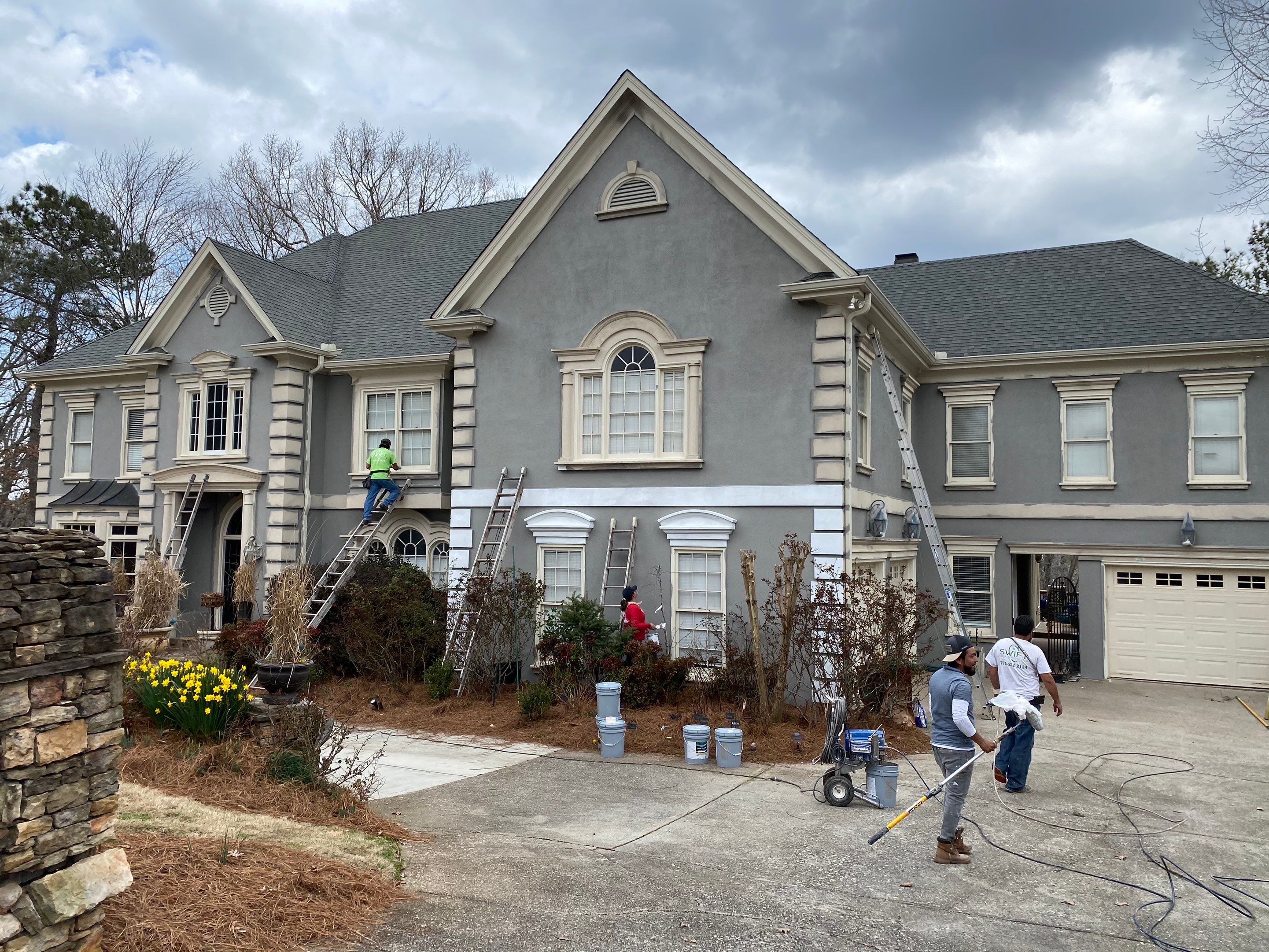 Exterior Stucco Painting and White Trim Update in Roswell by Swift Home Renovations