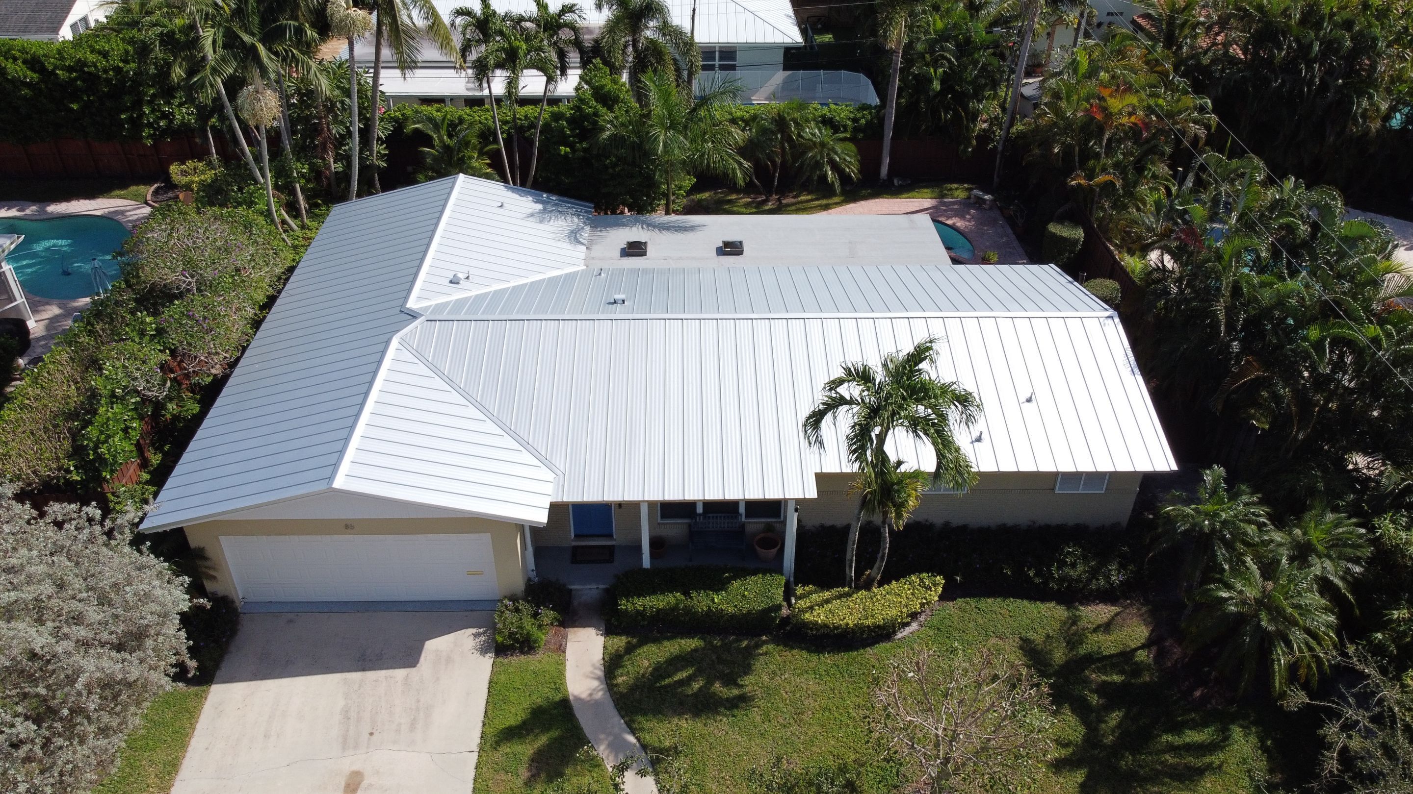Residential Roofing Installation using 1" Nail strip metal roof by BLUES BROTHERS CONSTRUCTION CORP
