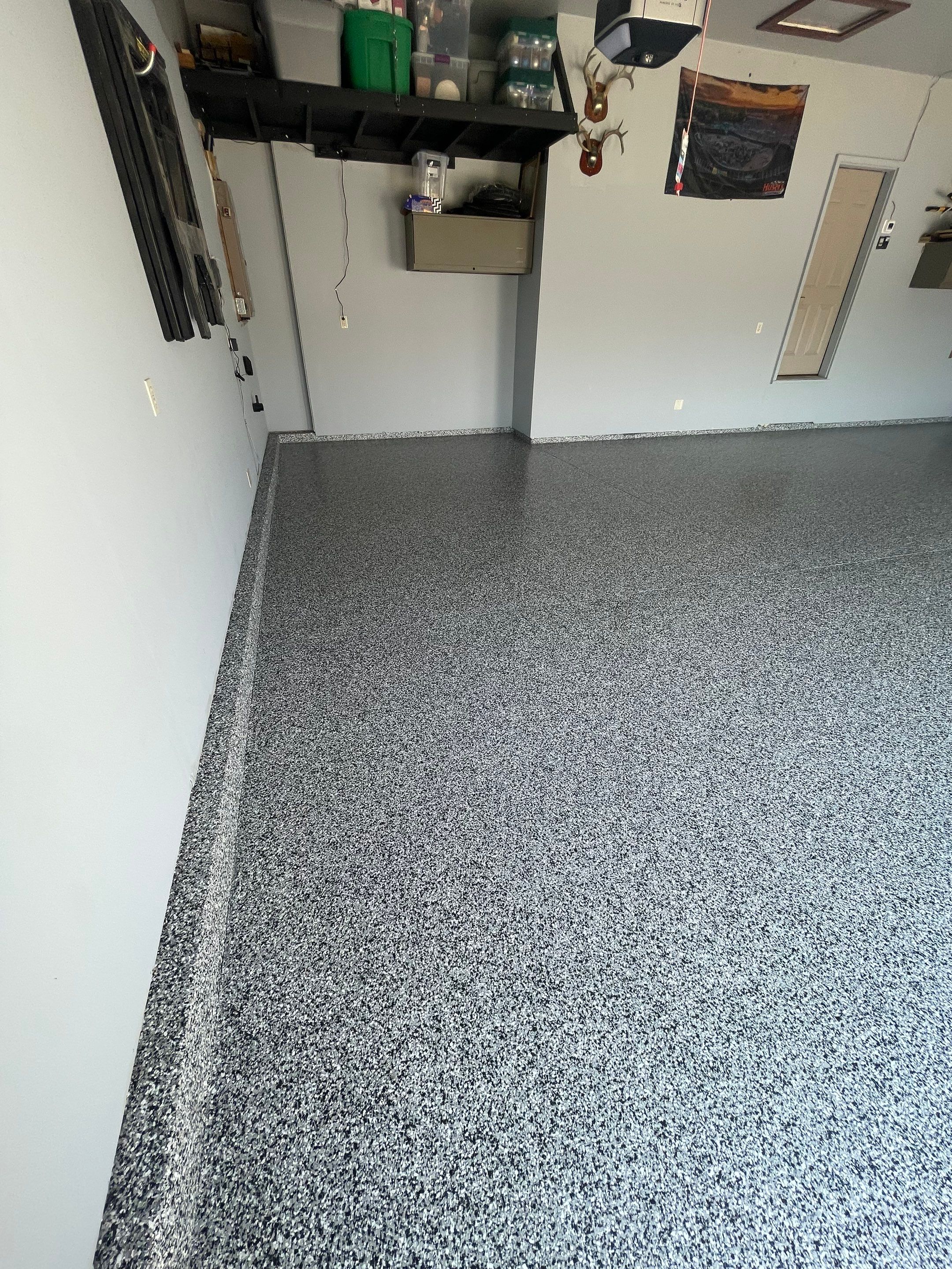 Sioux Falls Garage Concrete Coating Installation with Domino Flake by Select Painting, Coatings & Garage Cabinets