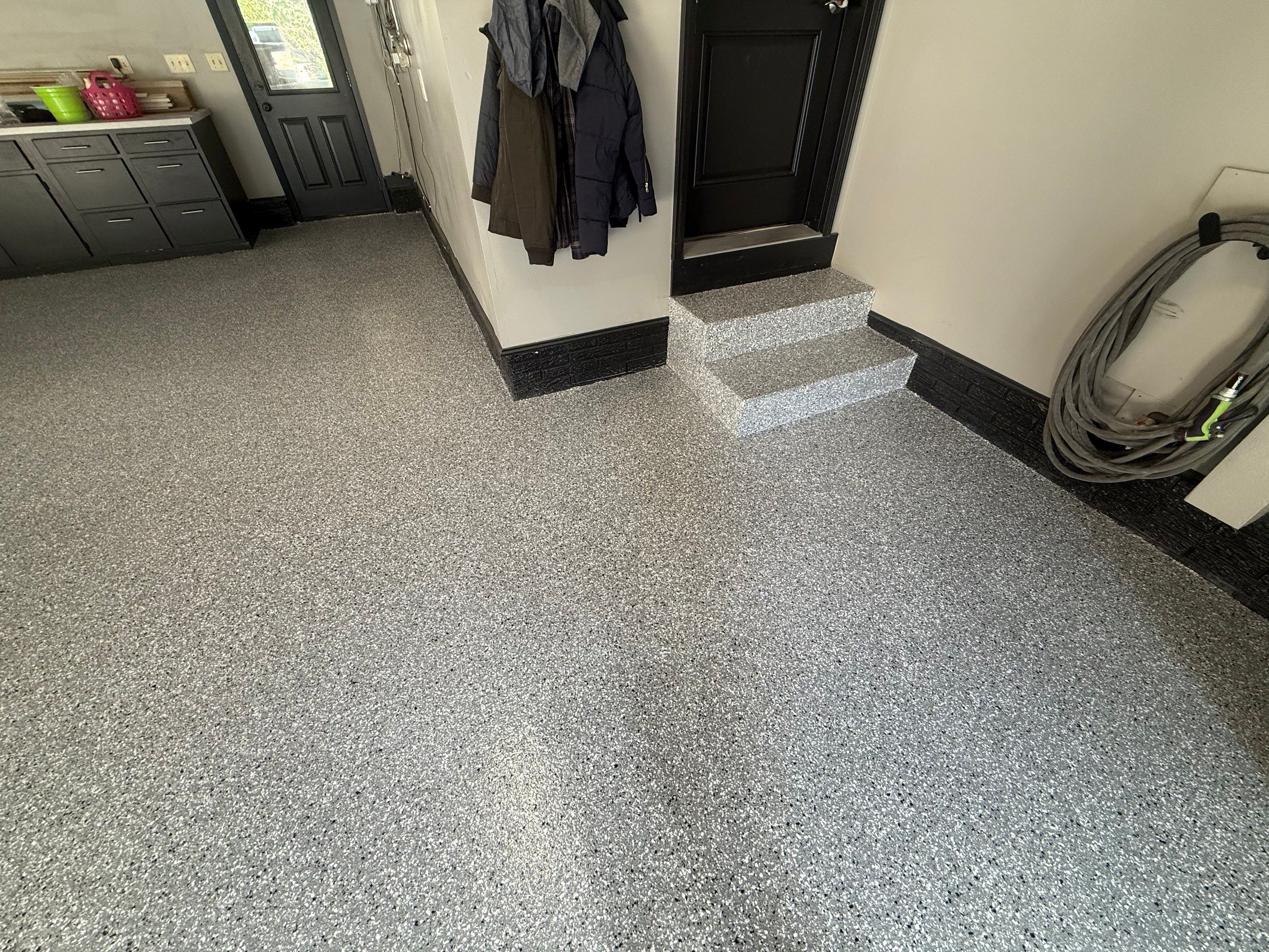Garage Floor and Textured Pool Deck Coating in Sioux Falls by Select Painting, Coatings & Garage Cabinets