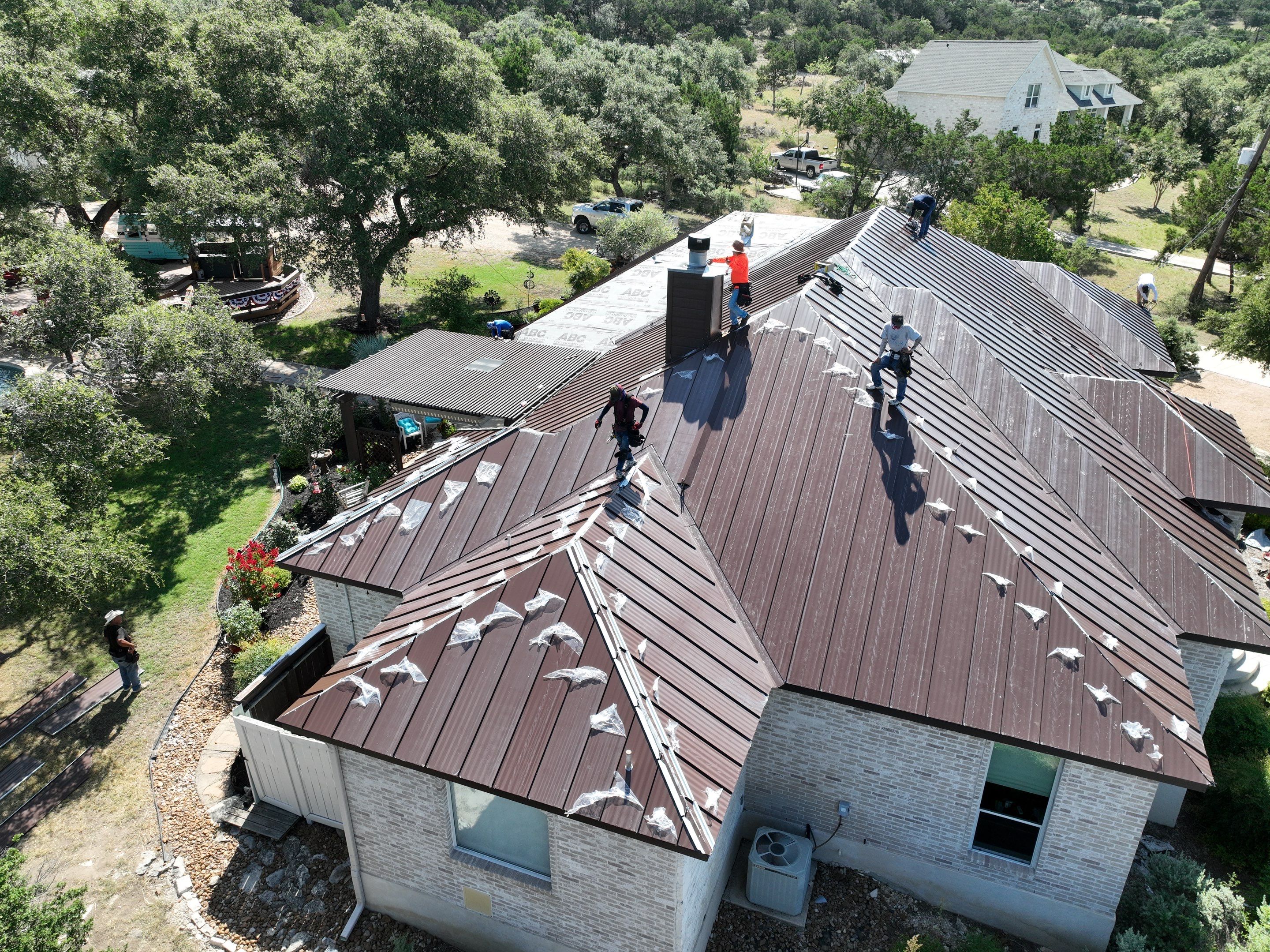 Residential Metal Roof Installation using McElroy Metal by Premier Roofing and Contracting