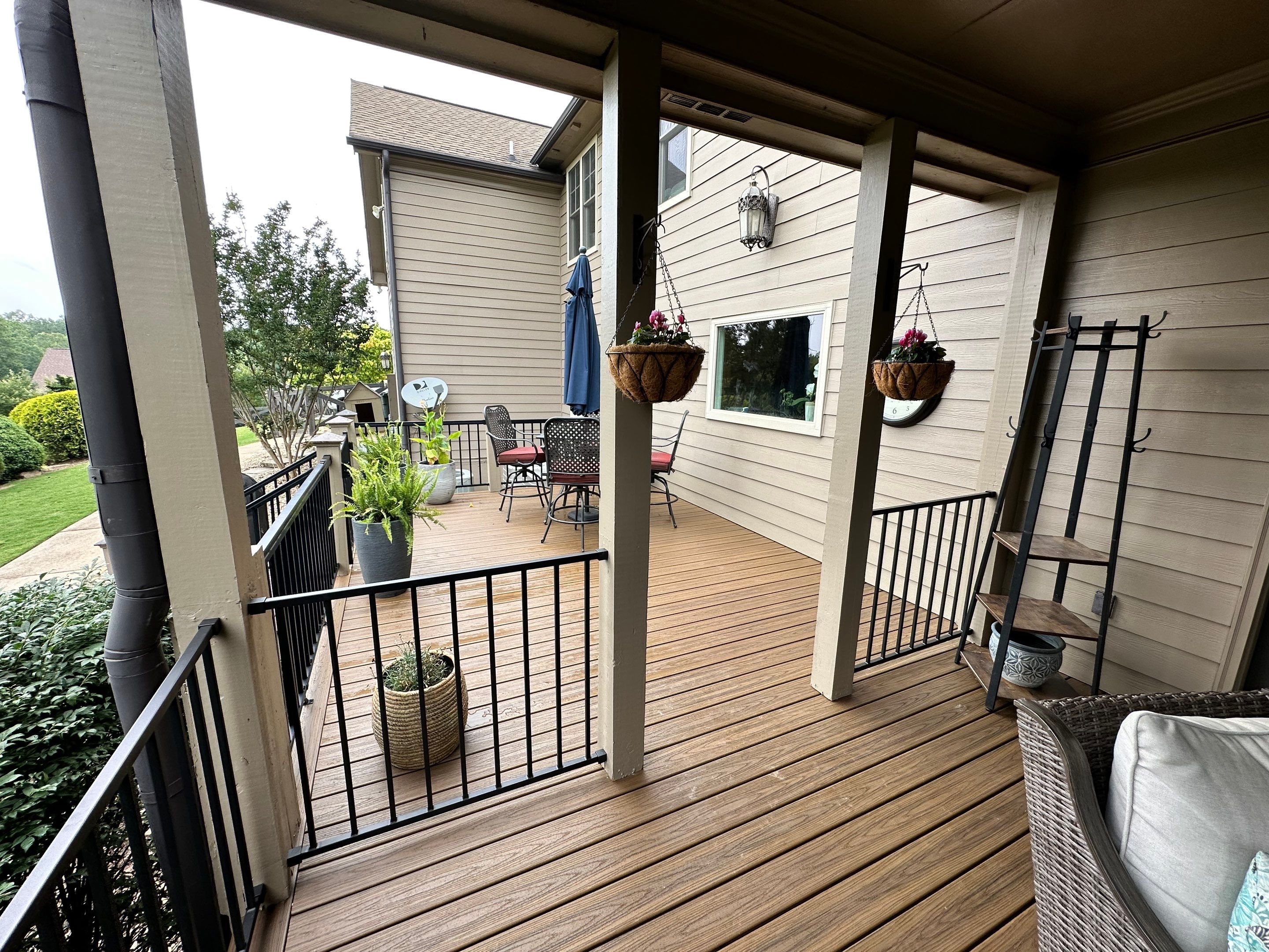 Composite Deck Flooring and Black Metal Railing Replacement in Dallas by Swift Home Renovations