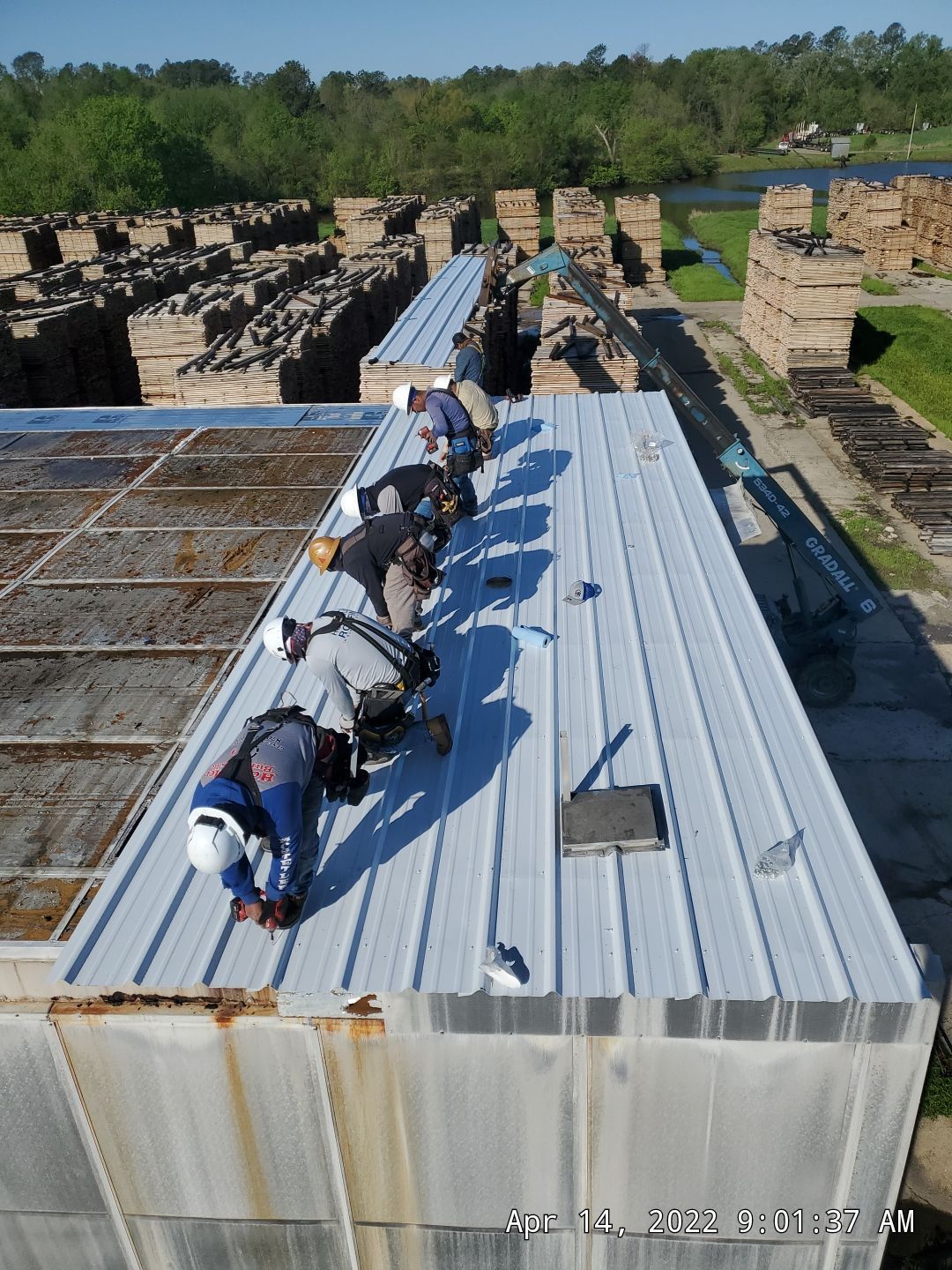 Commercial Roofing Installation using Aluminum Roofing panels by Hostetler Roofing