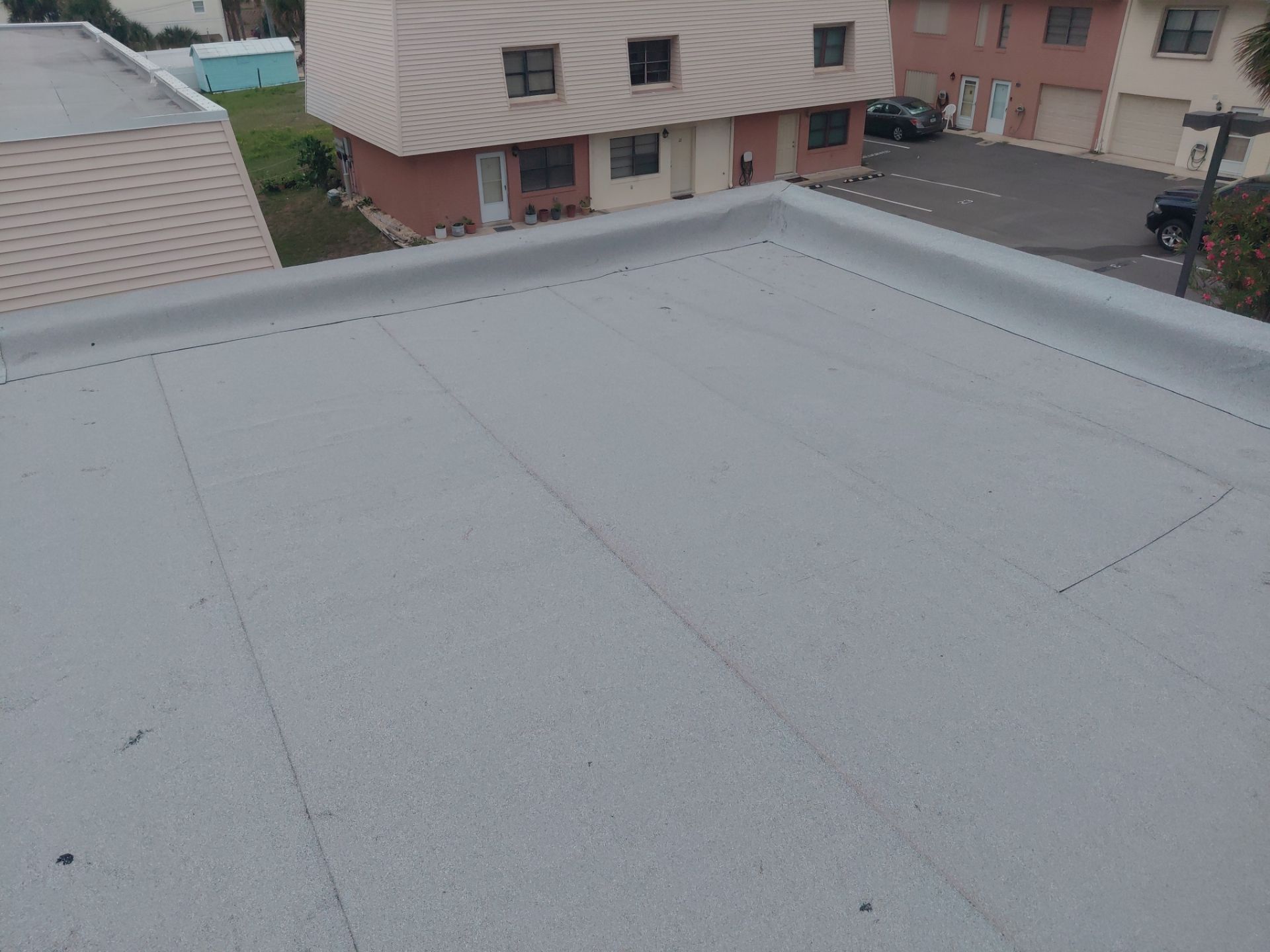 Flat Reroof Replacement Daytona Beach Shores FL by Pinnacle Roofing Group