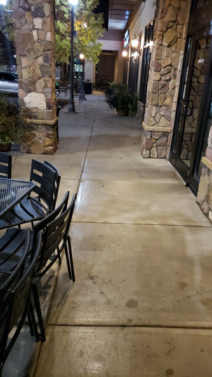 contrete cleaning using cleaner by Power Wash Masters LLC