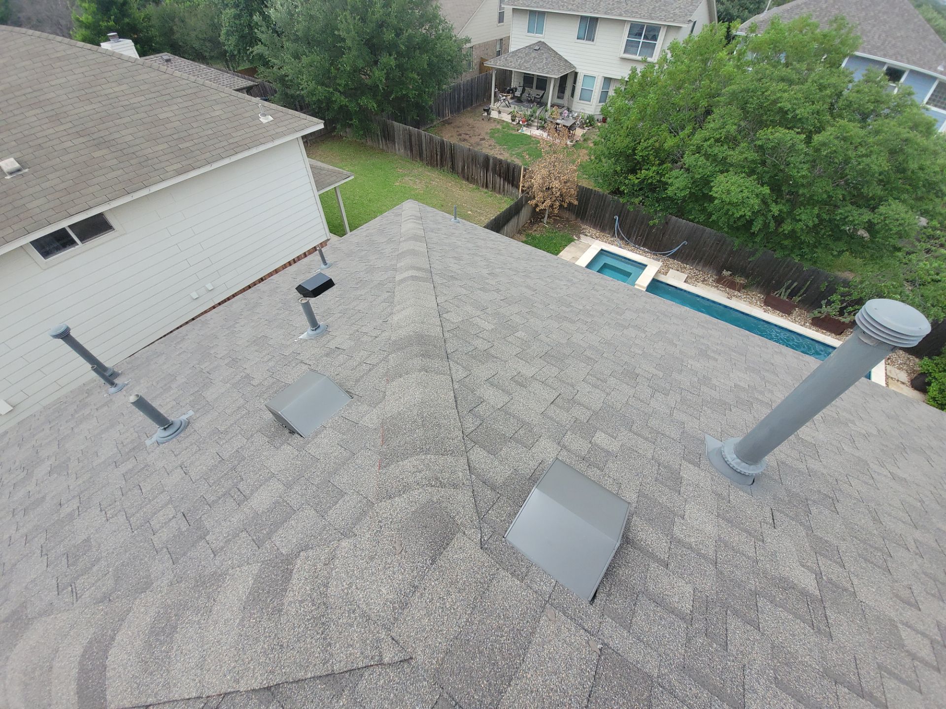 Residential Roofing Installation using IKO, Cambridge and gutters by Oakwood Roofing and Construction, LLC