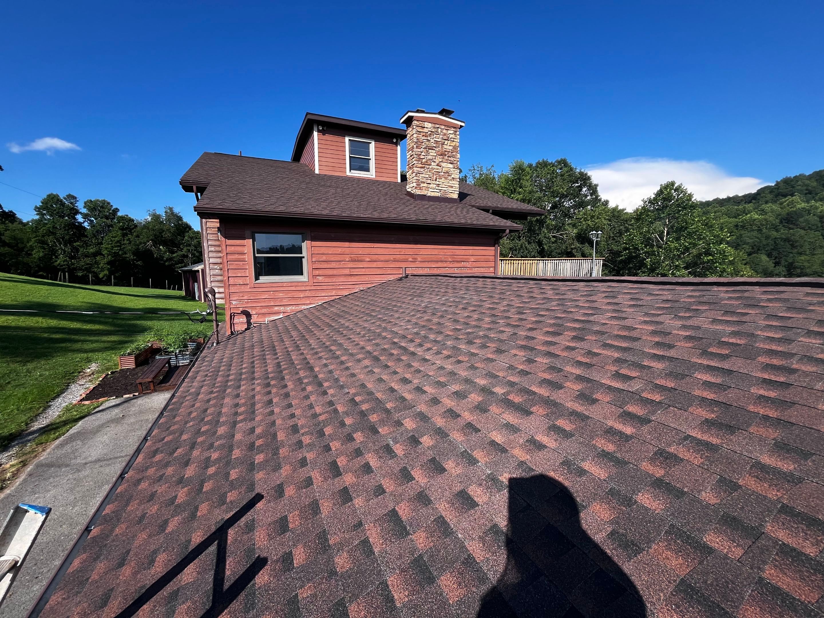 Residential Roofing Installation using GAF TImberline HDZ Hickory by Rainstoppers Roofing