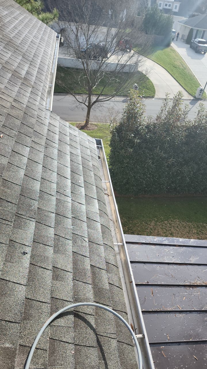 Gutter Cleaning using water by Power Wash Masters LLC