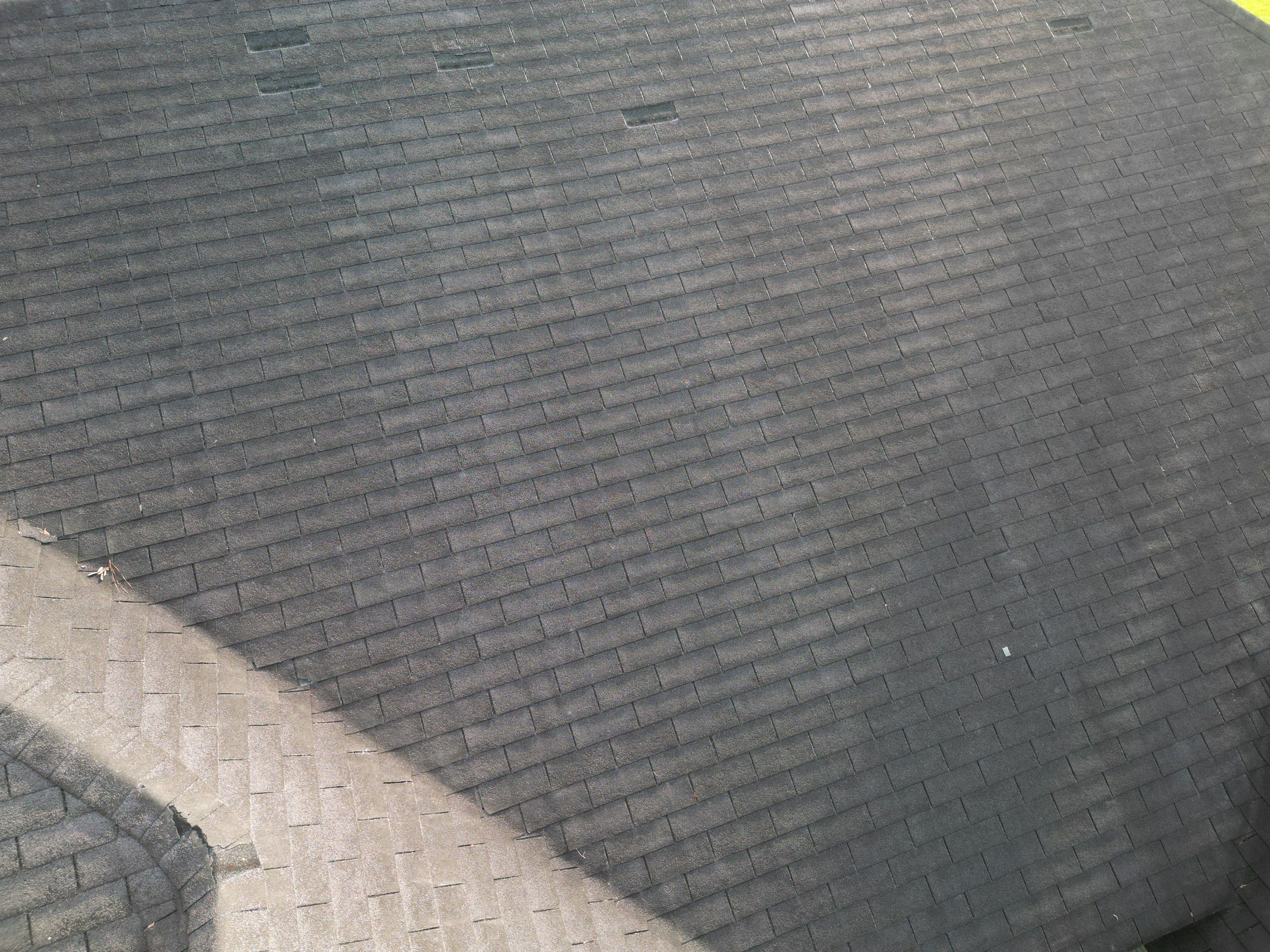 Residential Roofing Installation using Benton 26Ga 1inc Snapcock Metal Roof KYNAR Matte Black by Talya Roofing