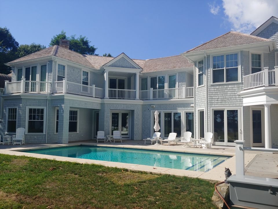 Gutter Installation using 6" Half Round Aluminum Gutter over Crown Moulding by Gutter Pro Enterprises