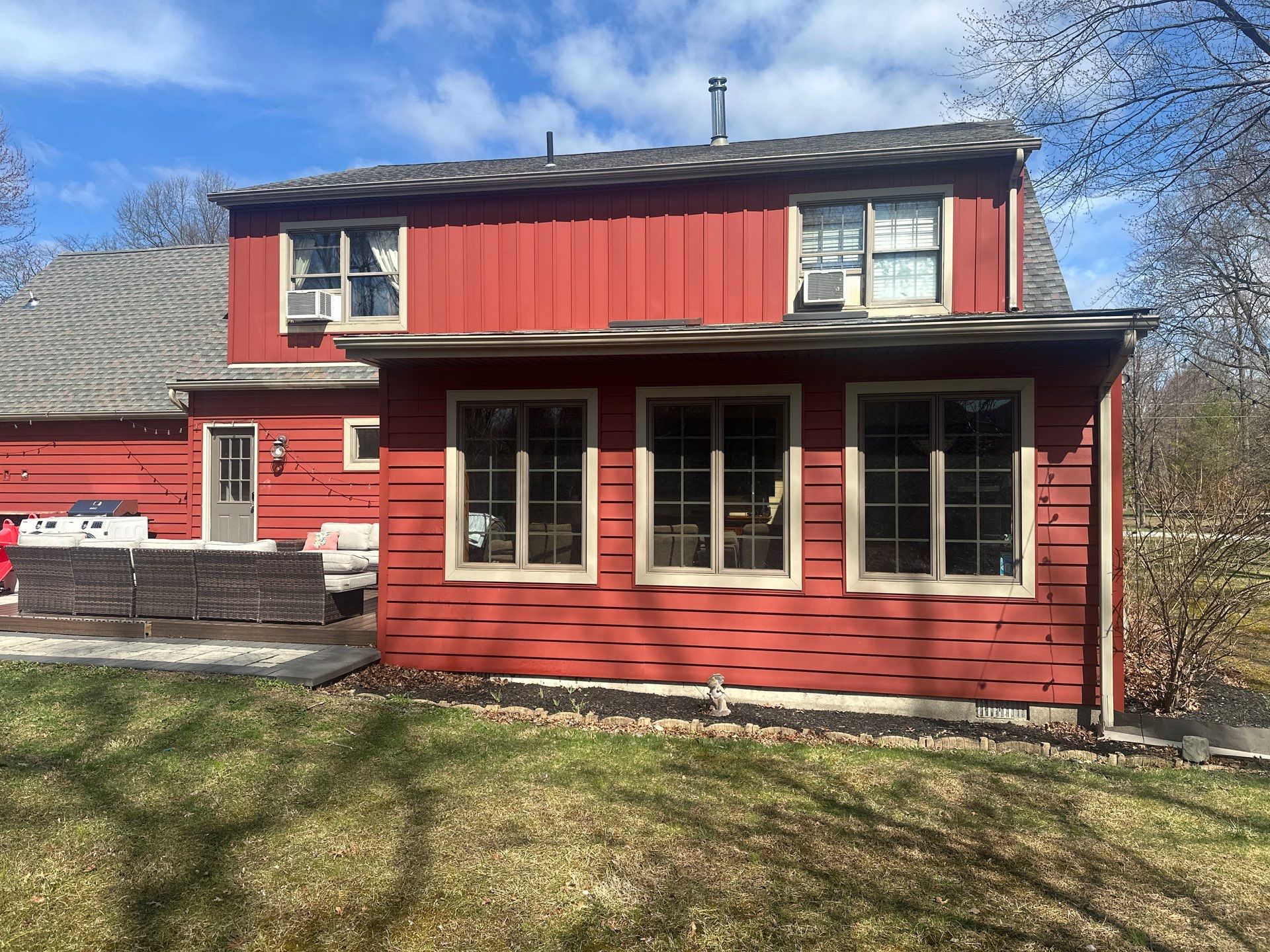 Red Siding in Beaver Dam NY by roberts roofing