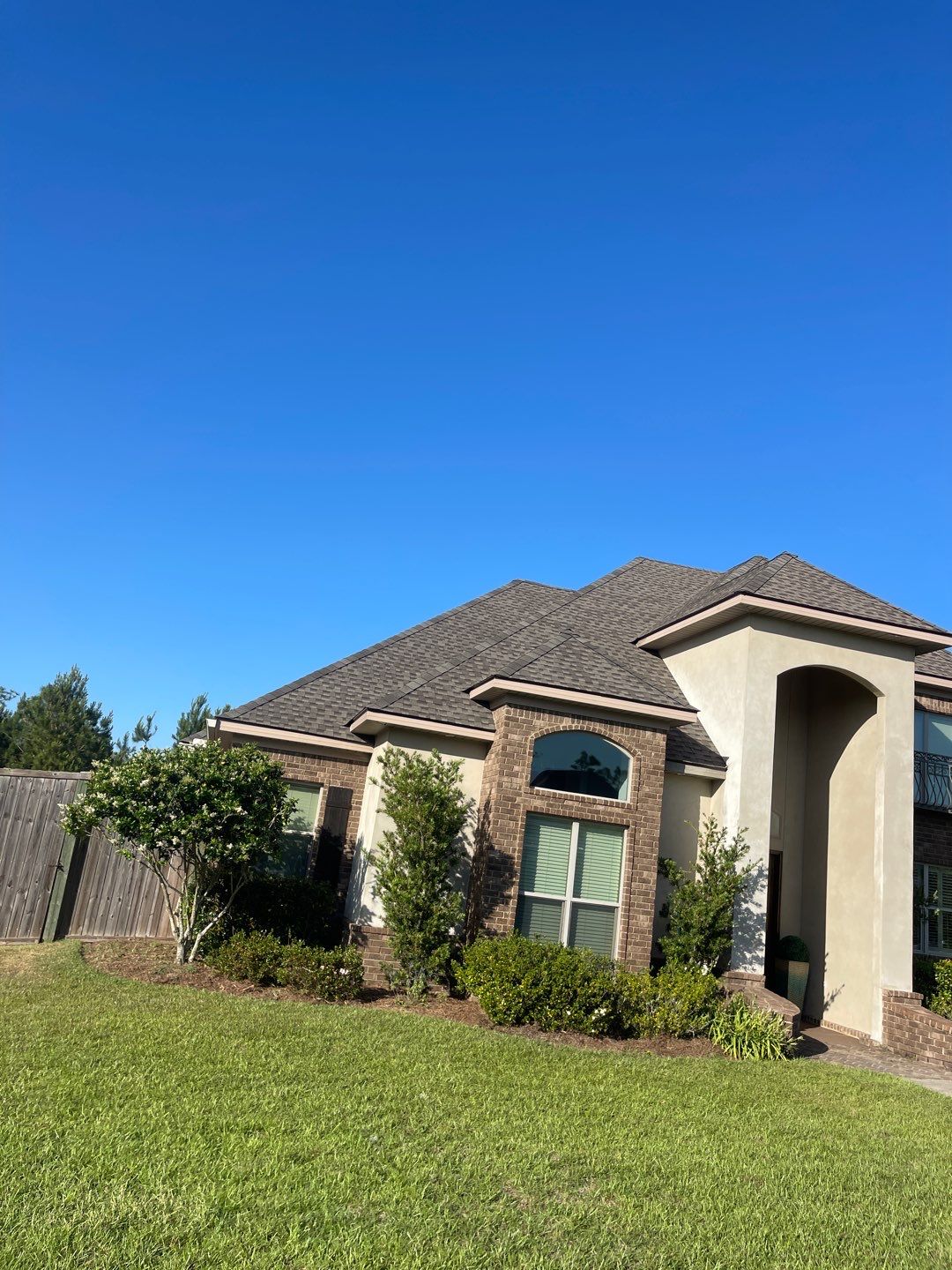Residential Roofing Installation using Roof Replacement by American Roofing & Construction LLC