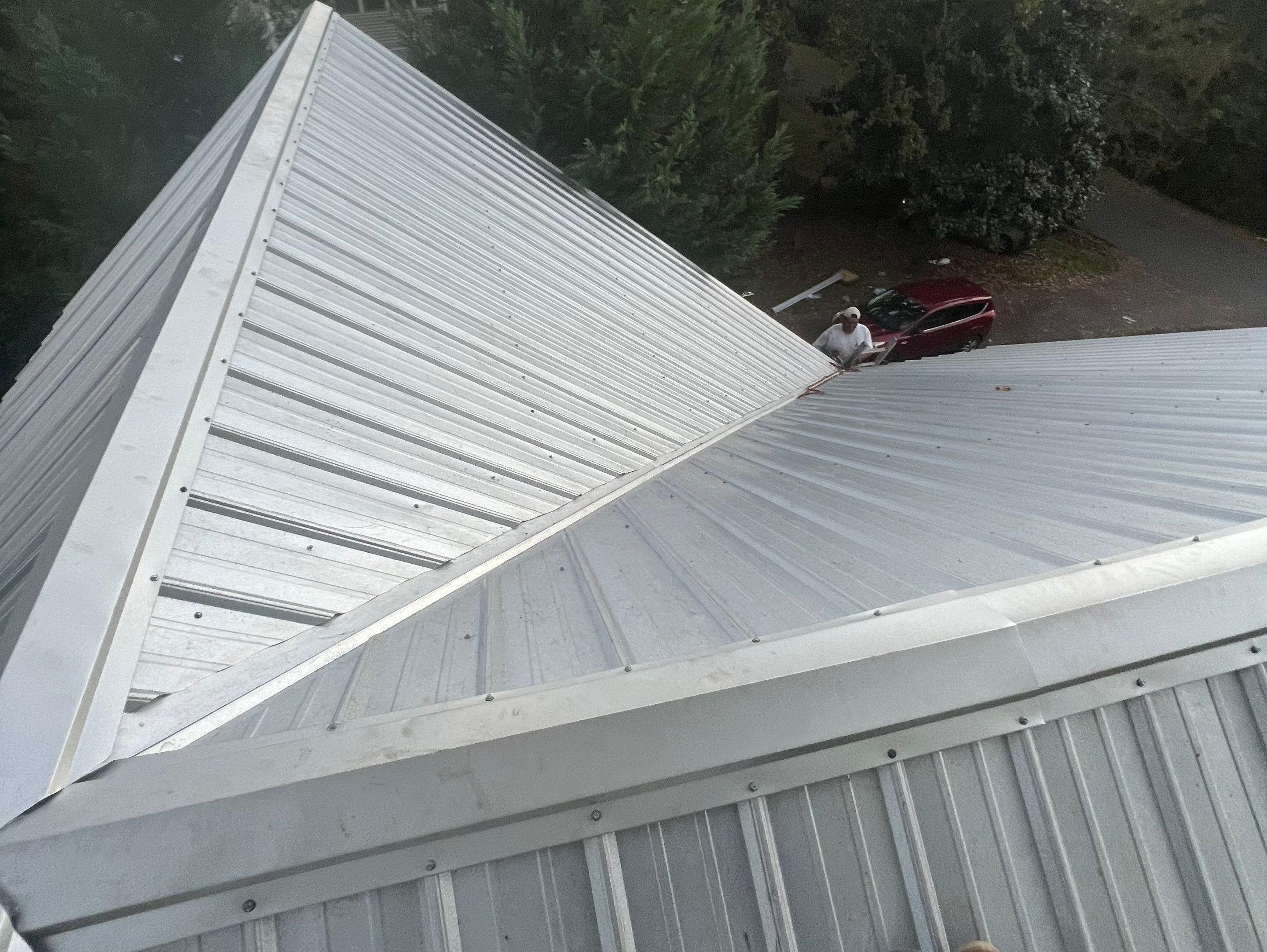 Residential Roofing Installation using 26 Gauge Metal by The Roofing Dudes