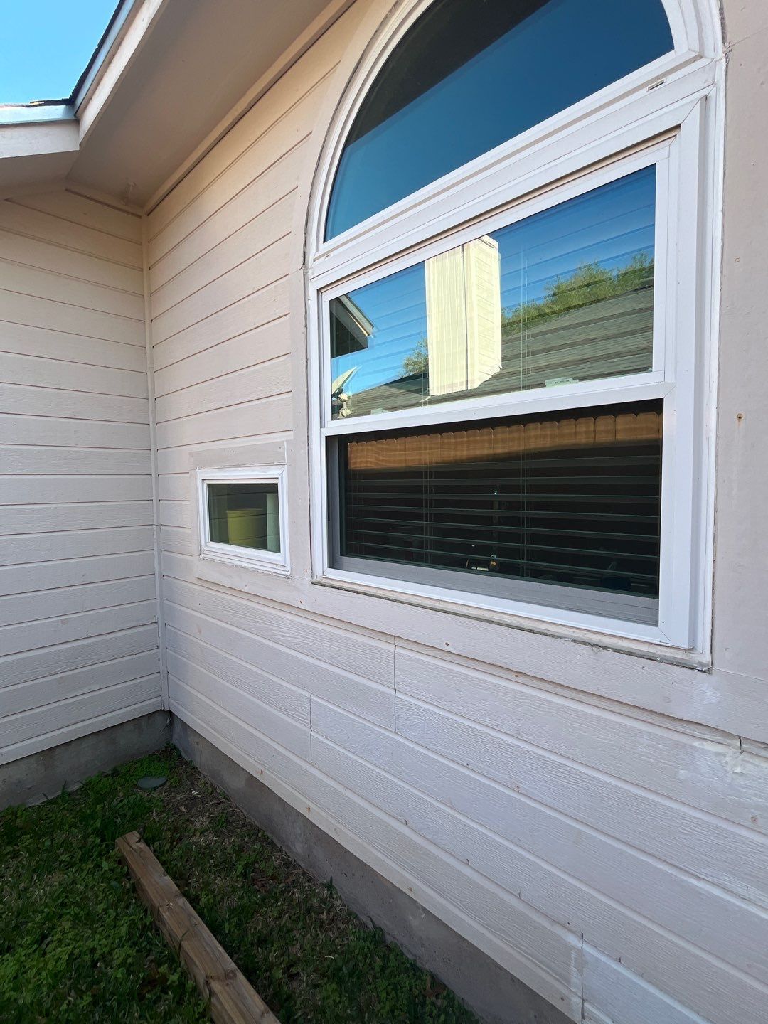 Windows with a side of Siding  by Bayfront Roofing and Construction