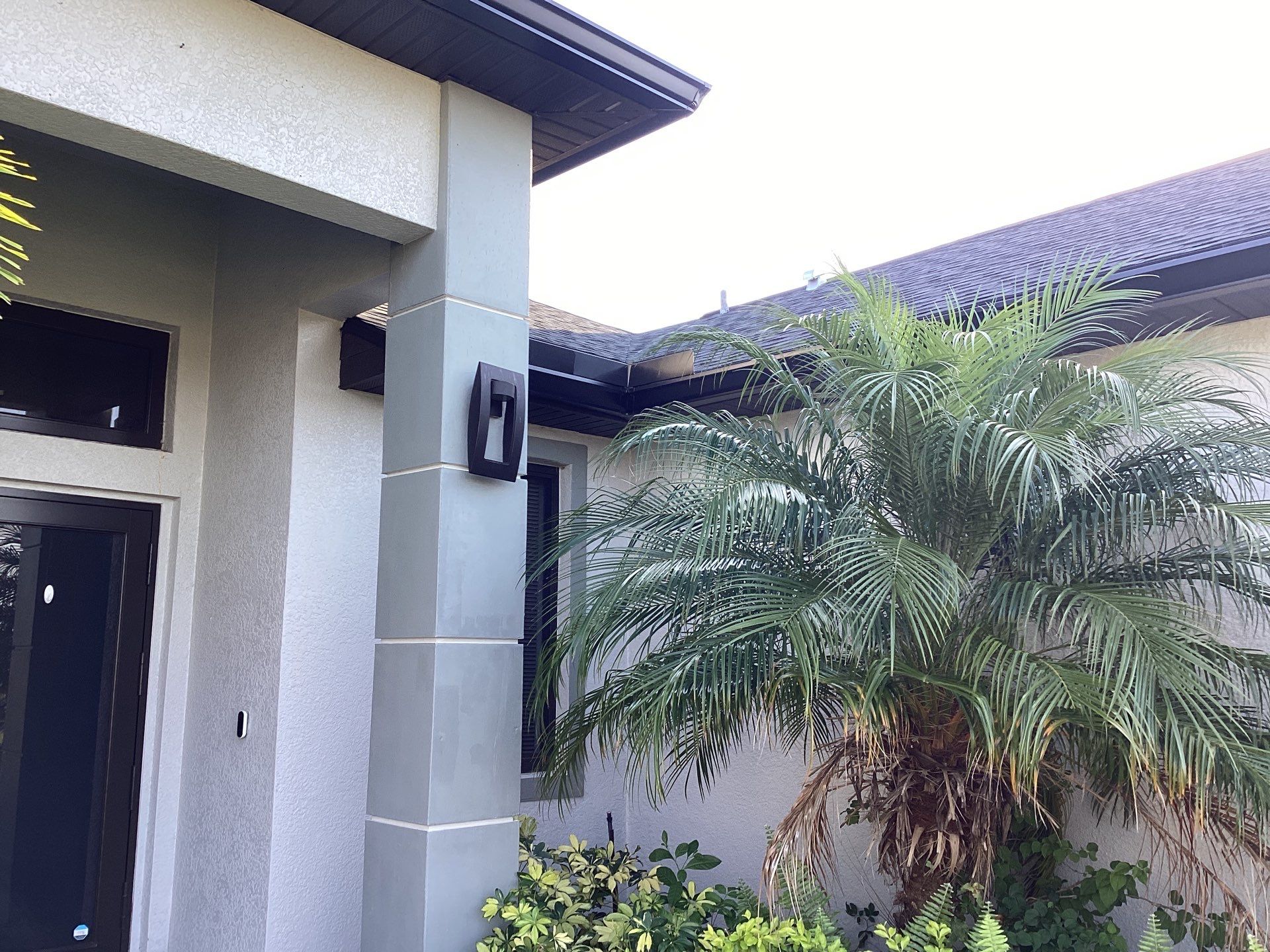 Black Seamless Gutters using 6 Inch Seamless Gutters in Cape Coral FL by Gutter Professors