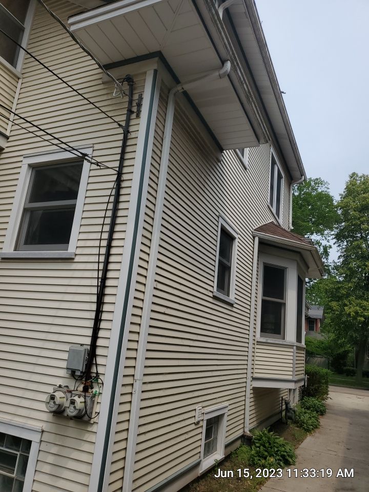 Housewashing  using Algaecide, soft wash soap by Northern Power Washing LLC.