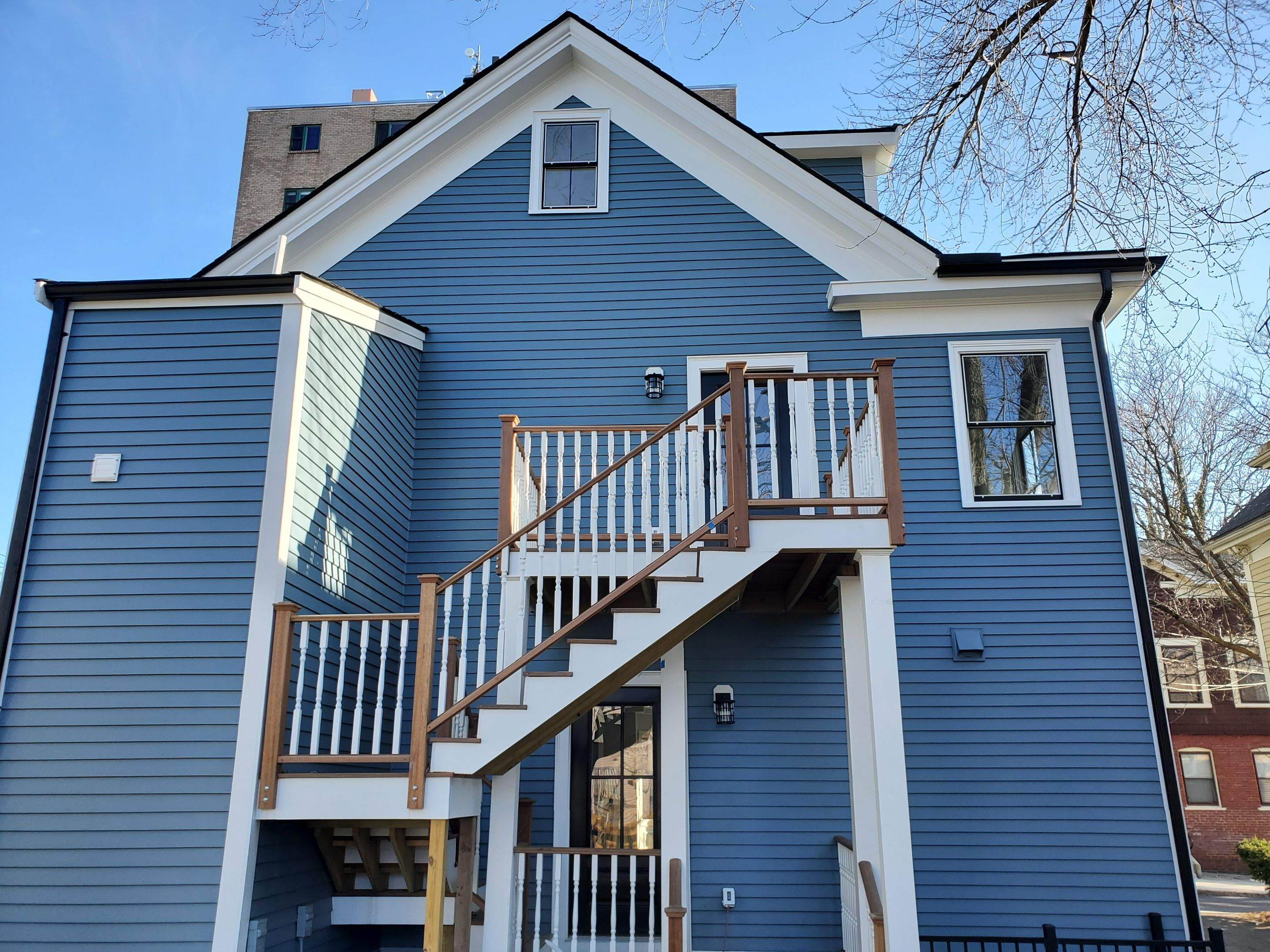 Siding Installation using Wood Clapboards by UBrothers Construction