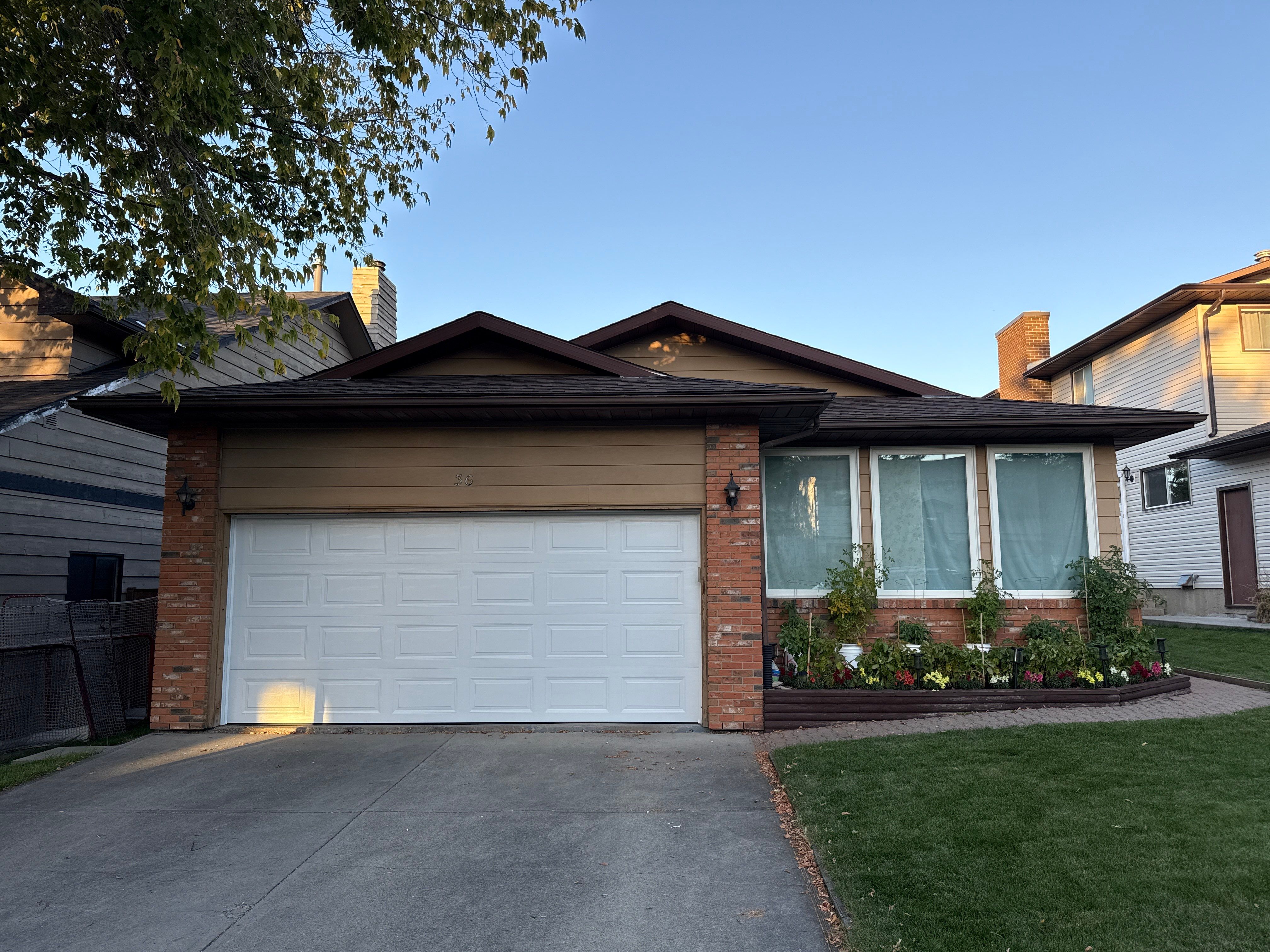 Calgary Chimney Chase Reconstruction and Exterior Siding Replacement by Smart Home Building Systems Ltd.