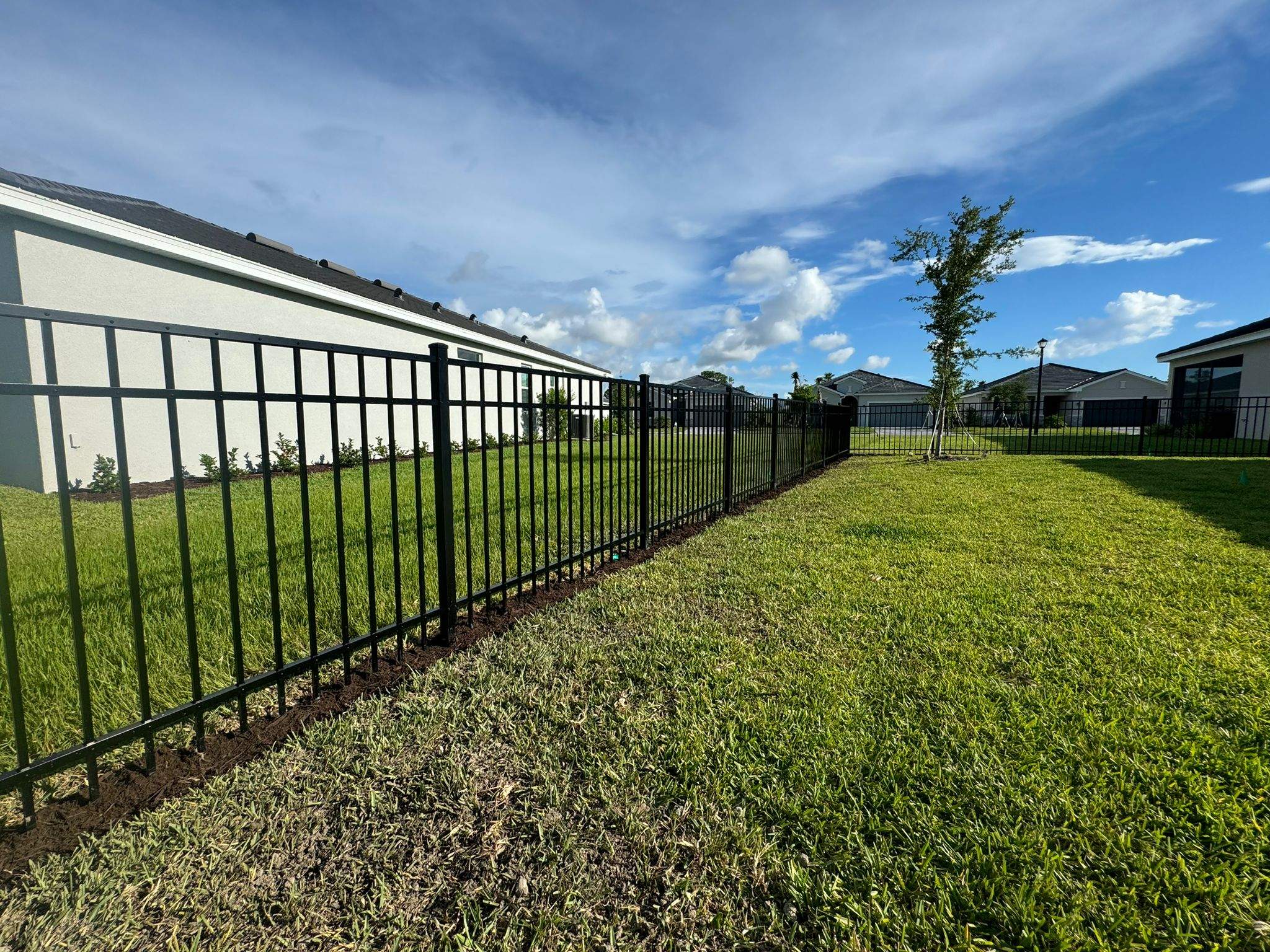 Black Aluminum Picket Fence Installation in Venice, Florida by True Fence LLC