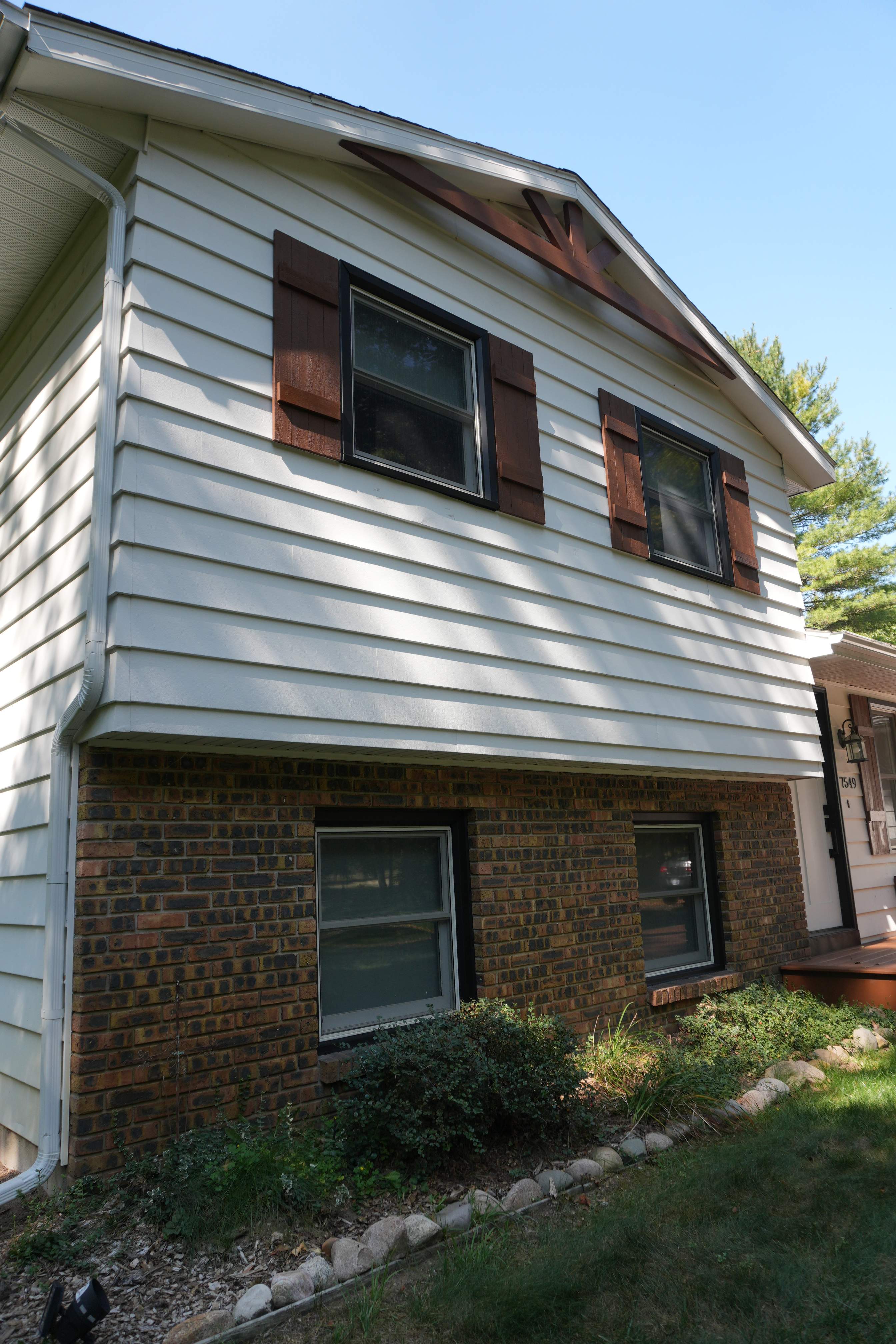 Exterior Remodel & Custom Deck by Cutting Edge Homes