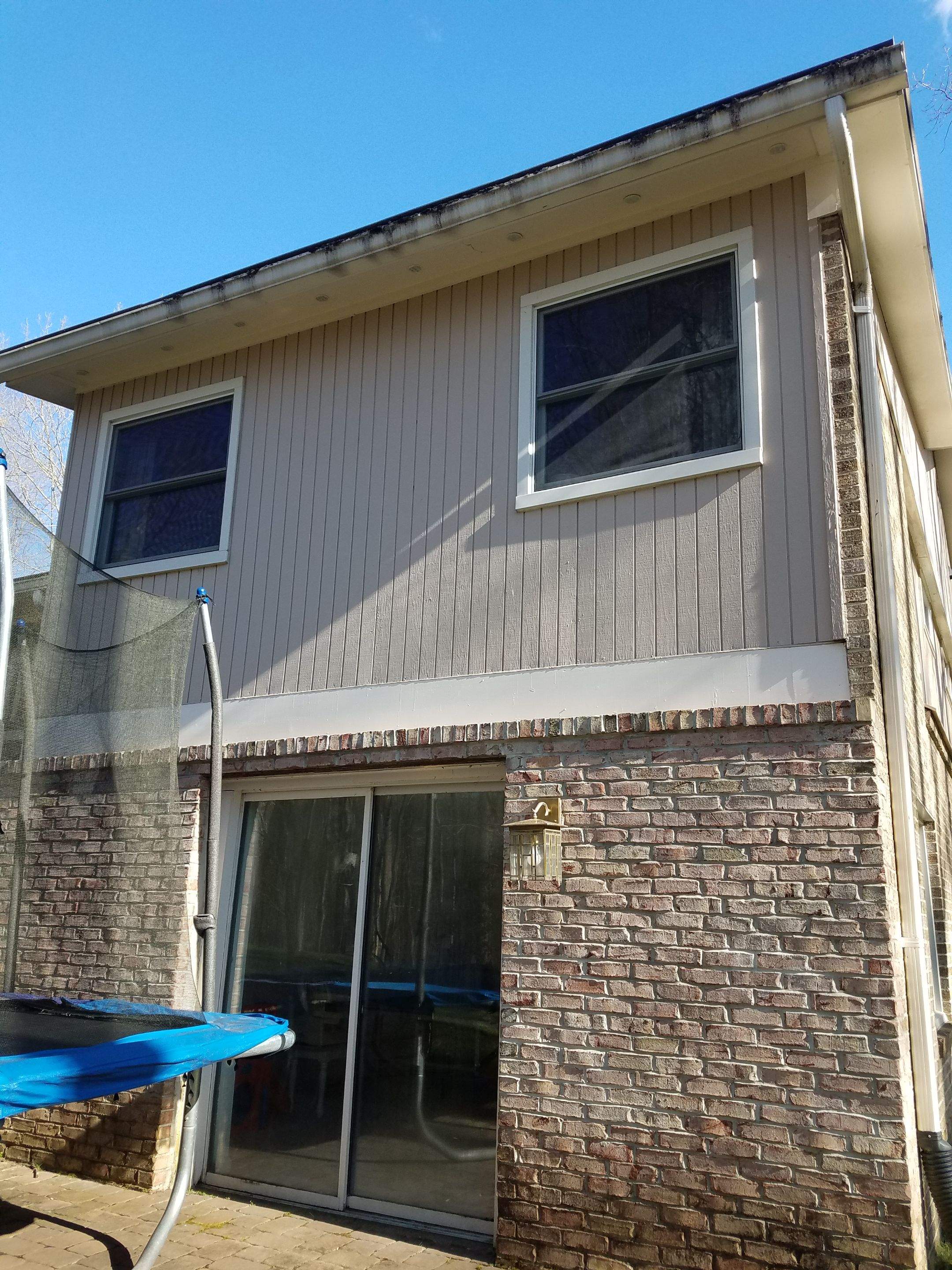 Roof, Siding, Door, and gutter replacement by American Home Contractors