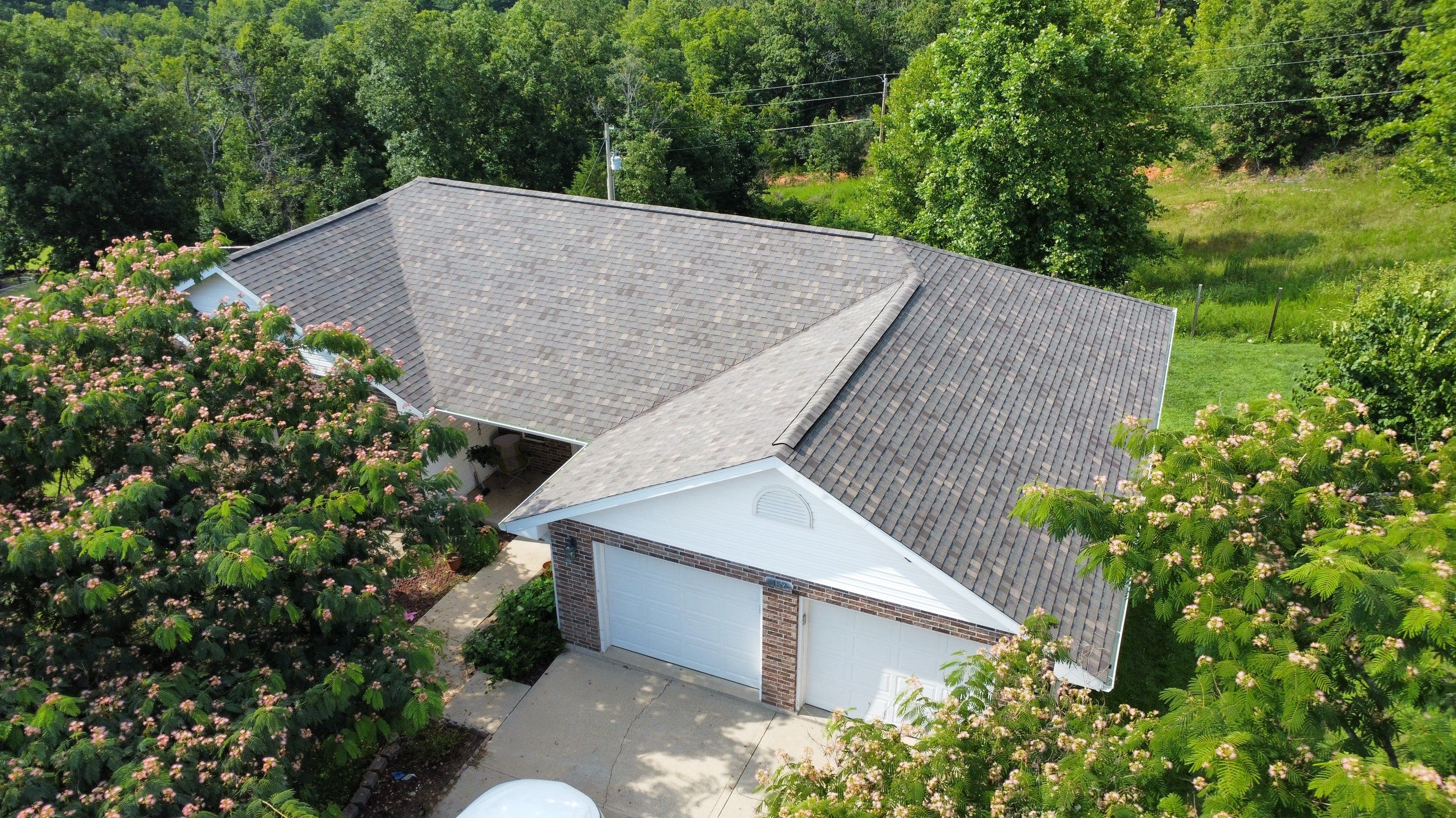 Residential Roofing Install - Atlas Pinnacle Pristine W/ Scotchguard - Color Weather Wood  by Titan Commercial & Residential Roofing 