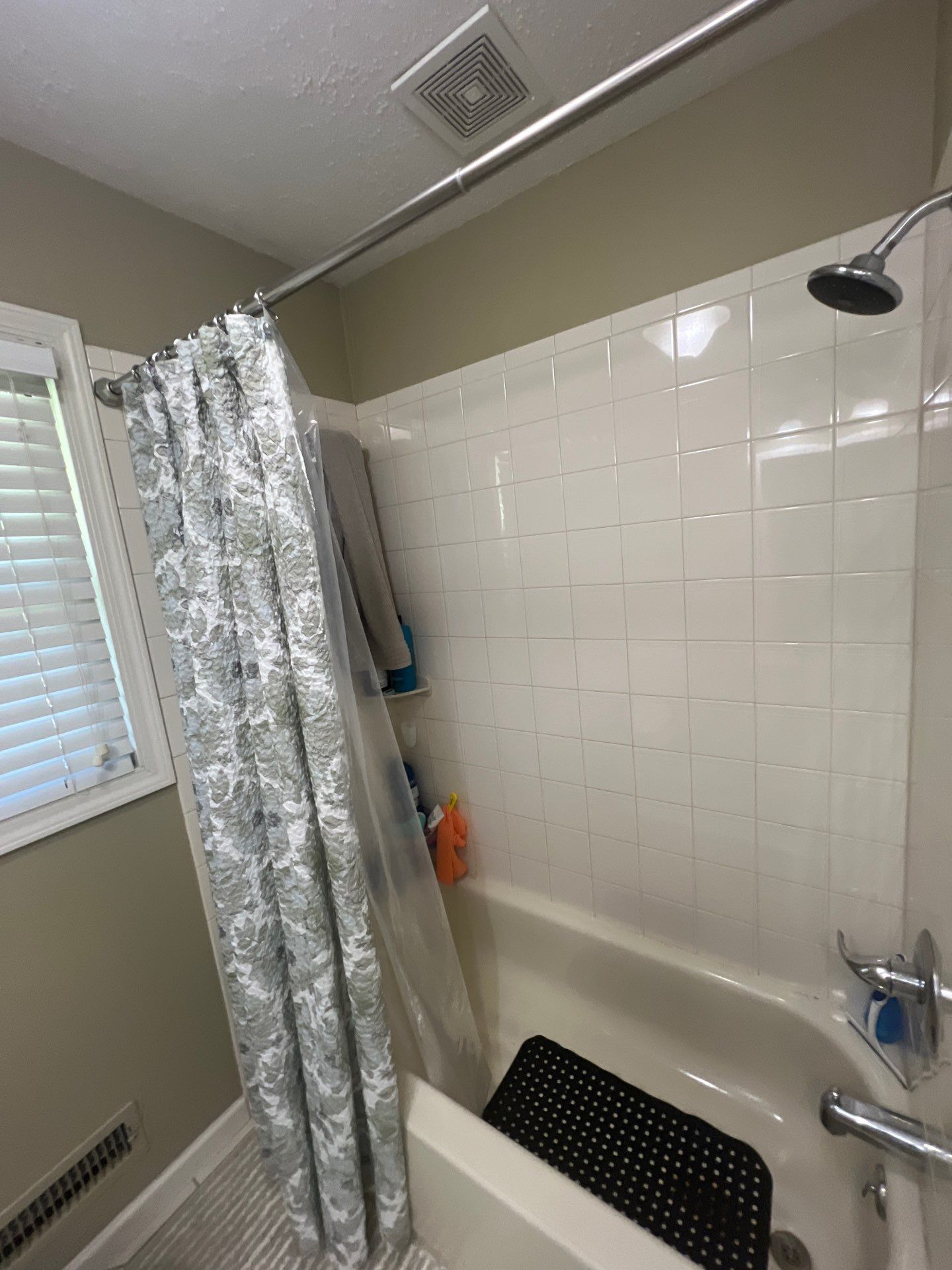Full bathroom with custom tile by The Shower Company