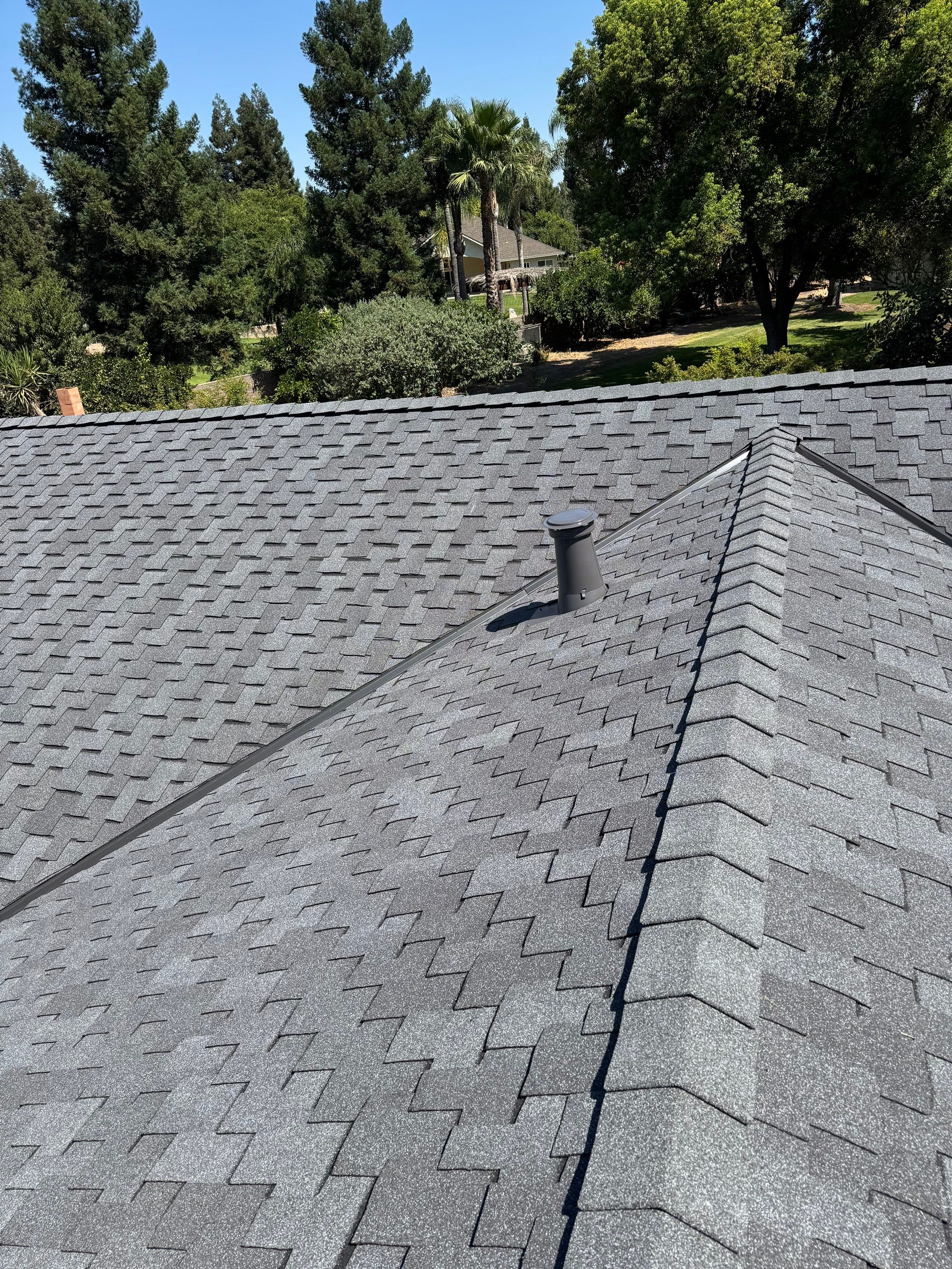Presidential shingle roof by Straight Edge Roofing Inc