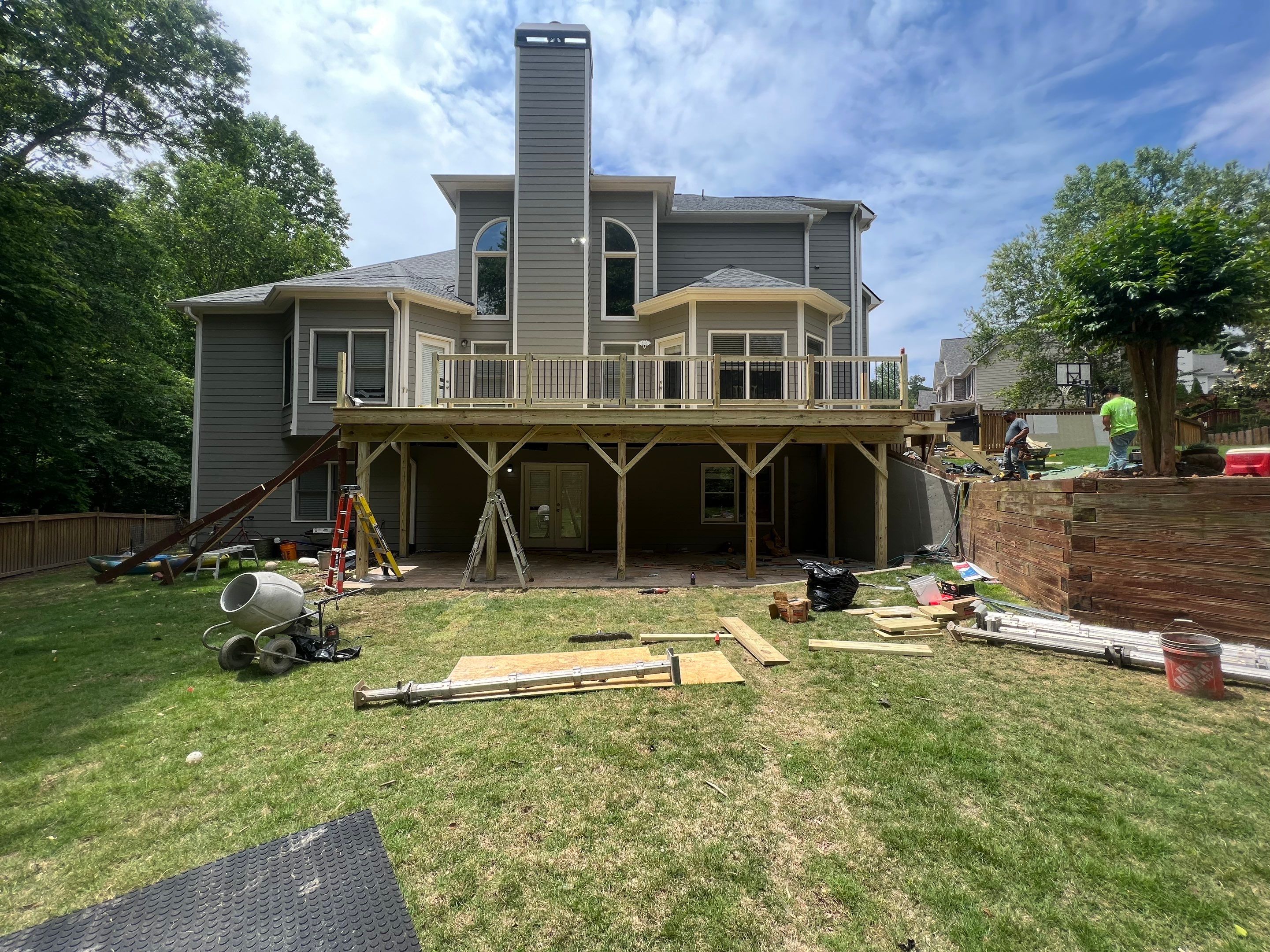 Elevated Wood Deck Replacement and Staircase Installation in Woodstock by Swift Home Renovations