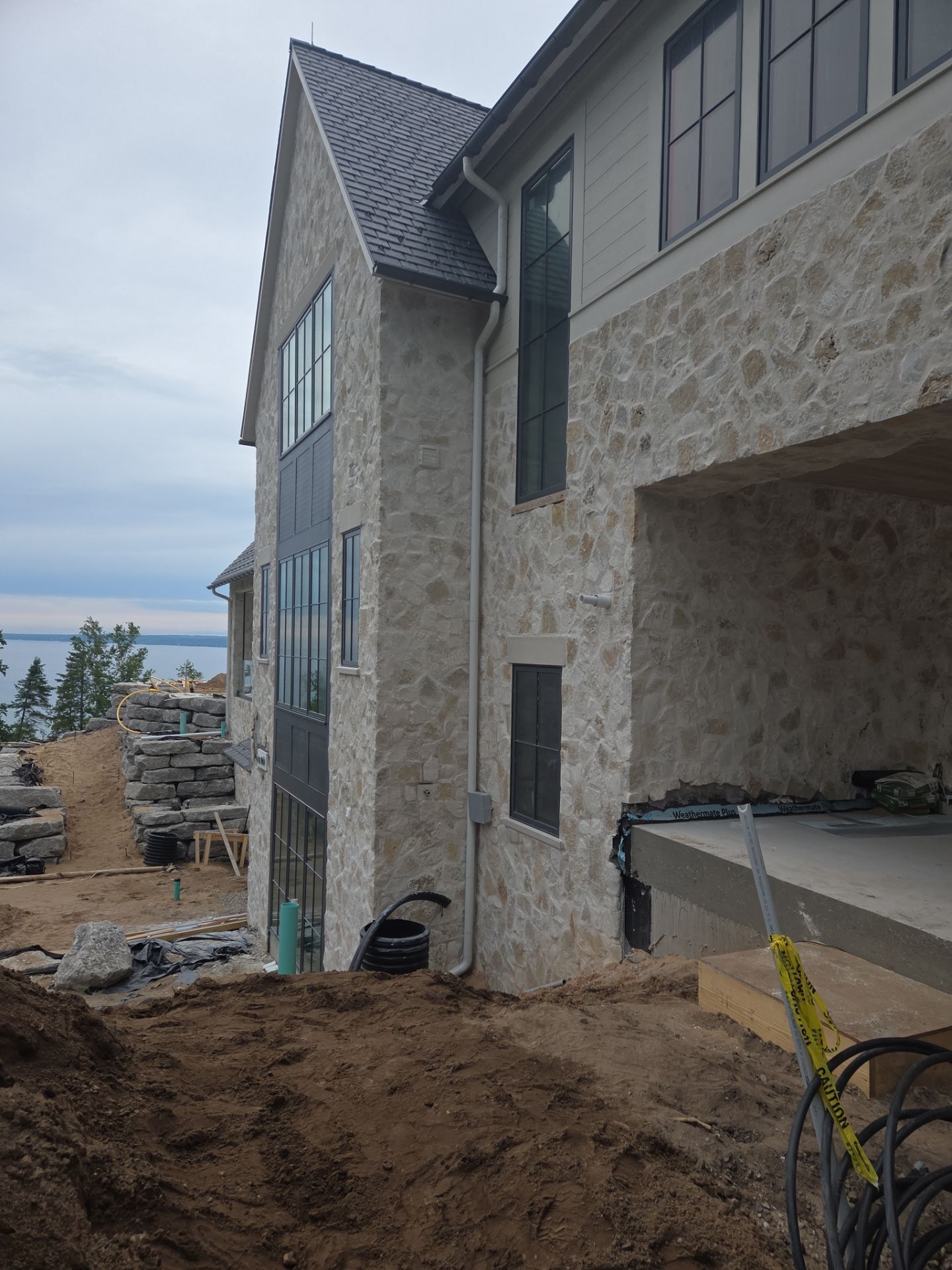 Half Round Gutter Installation for Petoskey Residence by Rainbow Seamless Systems