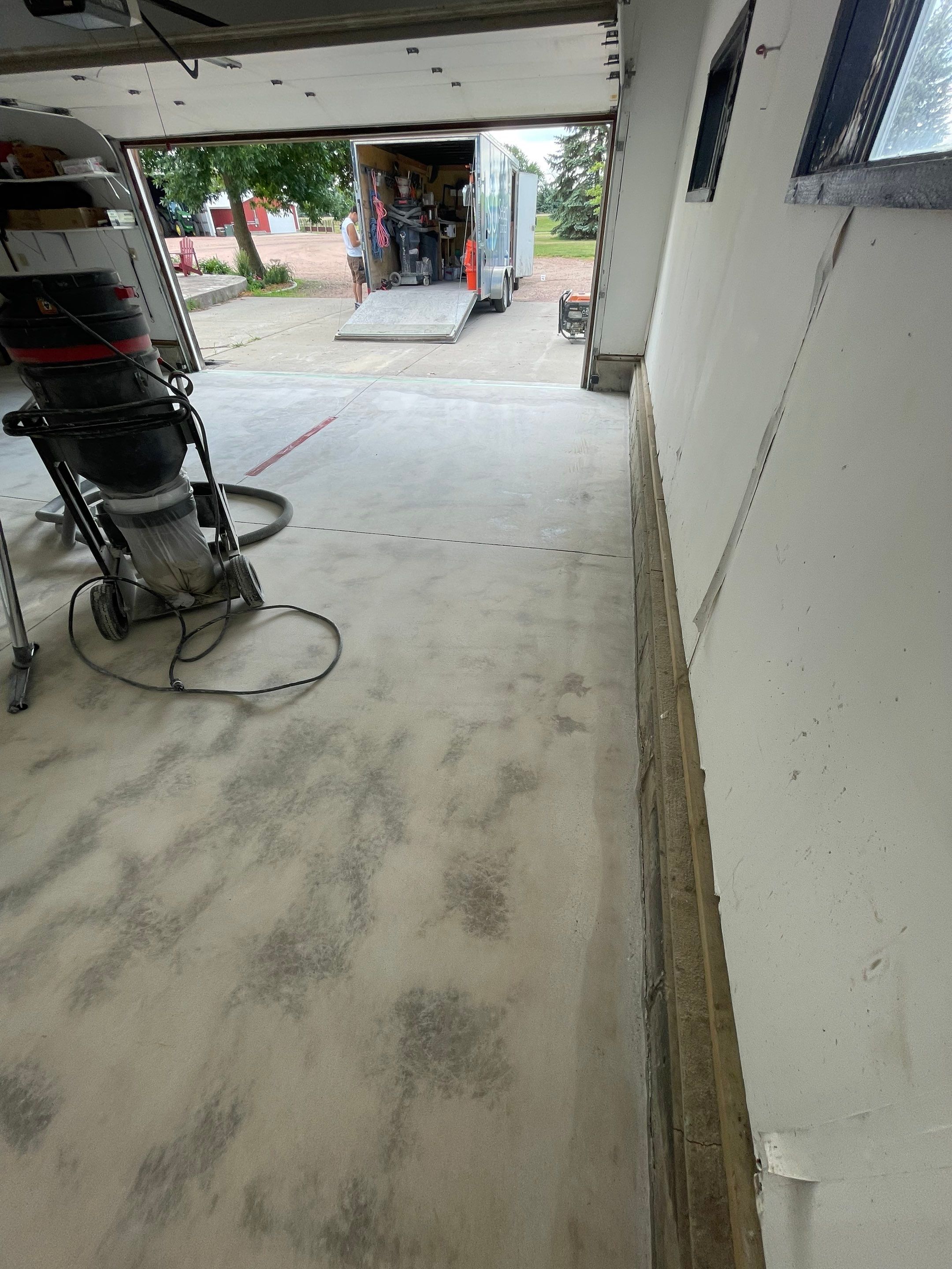 Hartford Residential Garage Floor Transformation With Decorative Chip Coating by Select Painting, Coatings & Garage Cabinets