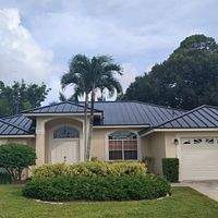 24ga 1.5" Mechanical Seam Matte Black by Total Roofing System The Metal Roof Experts