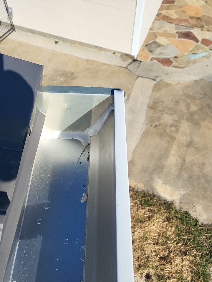 Gutter Installation using K-Style White Seamless Gutters by Gutter Professors