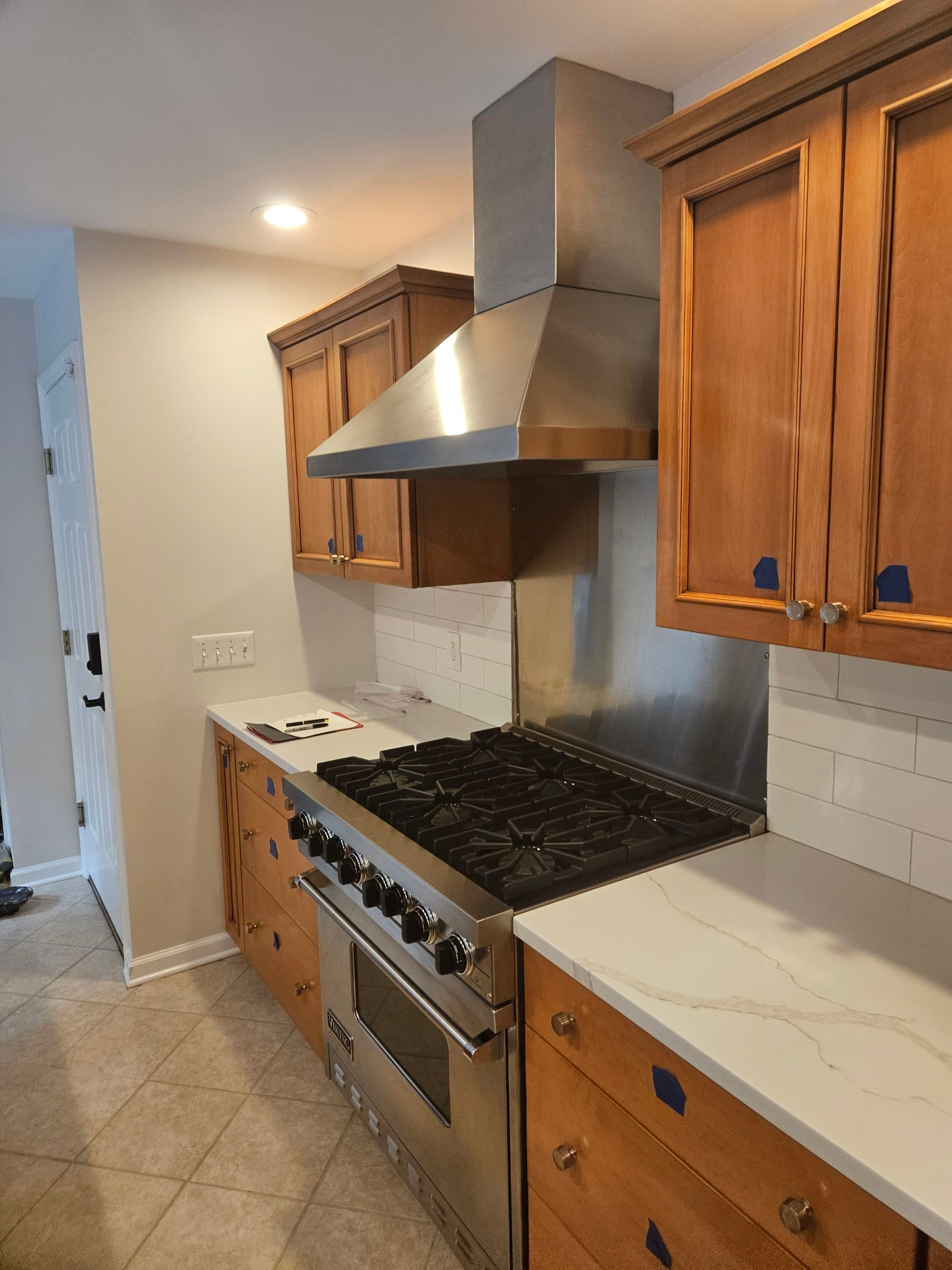 Chic Kitchen Cabinet Refinishing Project by Spectrum Painting, LLC
