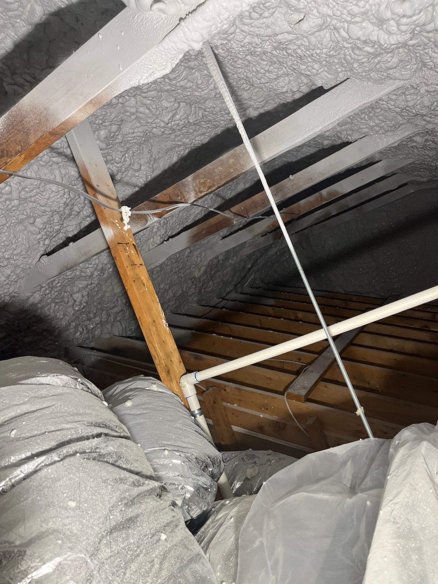 Attic Insulation using open cell spray foam by NYS Foam & Energy
