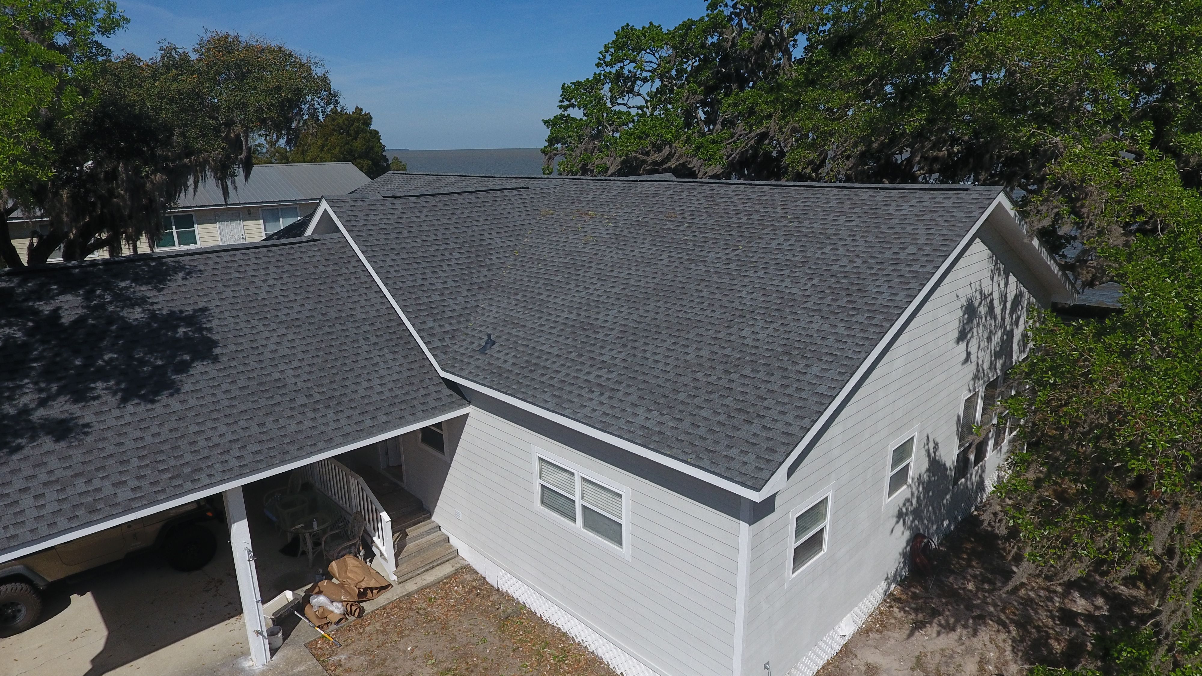 Residential Roofing Installation using Roof Replacement by American Roofing & Construction LLC
