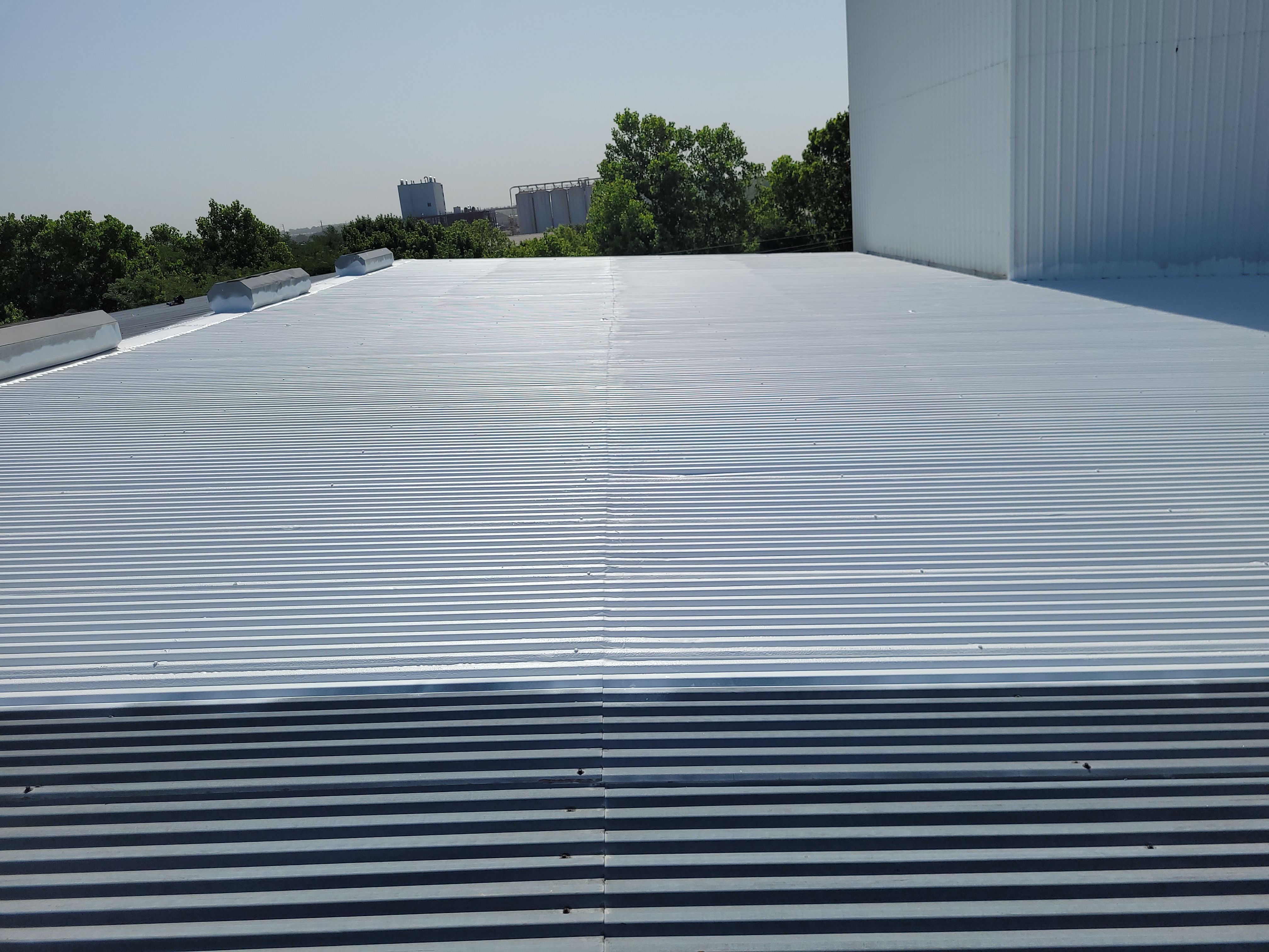 Commercial Metal Restoration System using Aldocoat Coatings by Hostetler Roofing