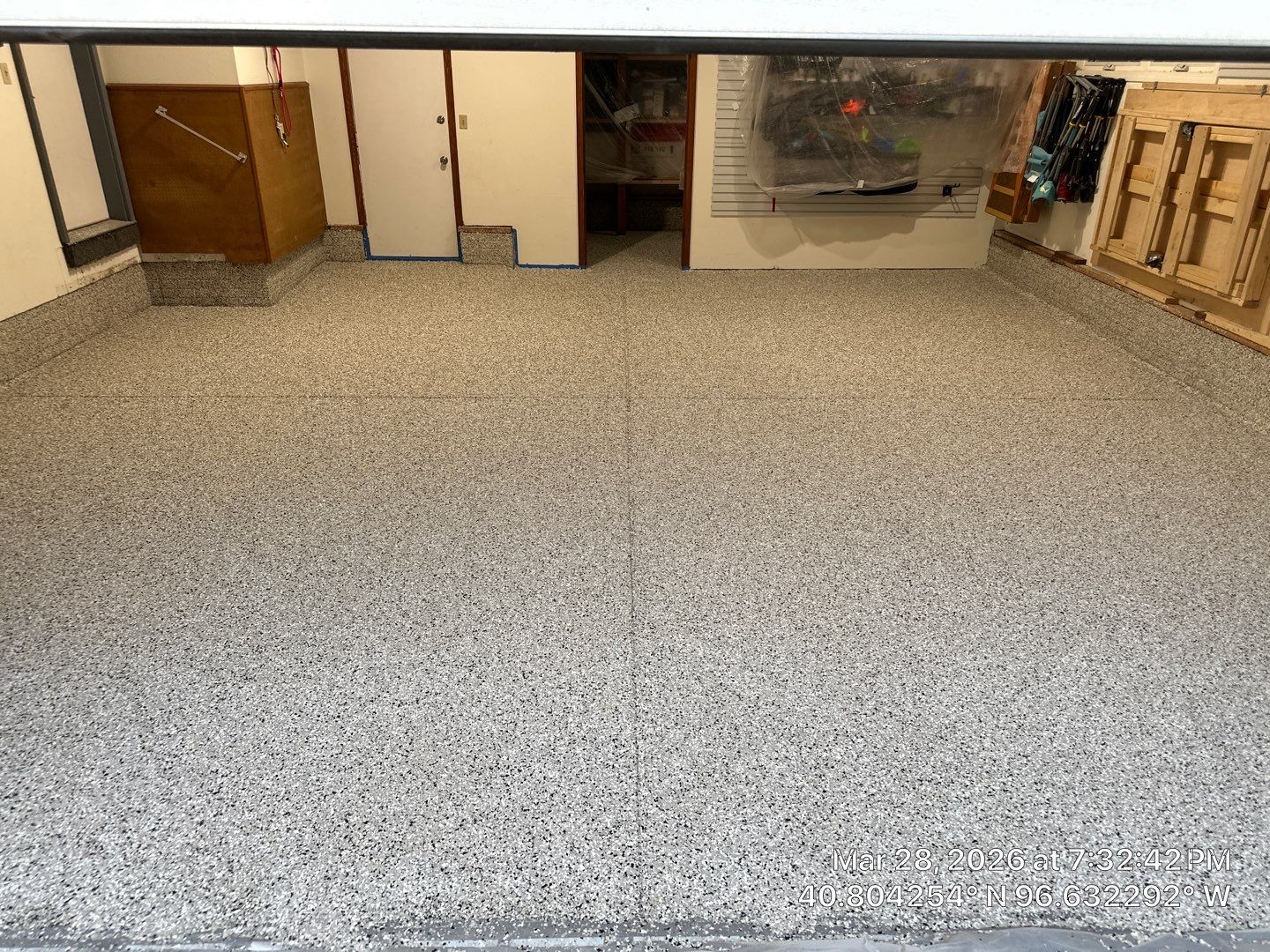 Two-Stall Epoxy Garage Floor Coating and Repair in Lincoln by Goat Coatings