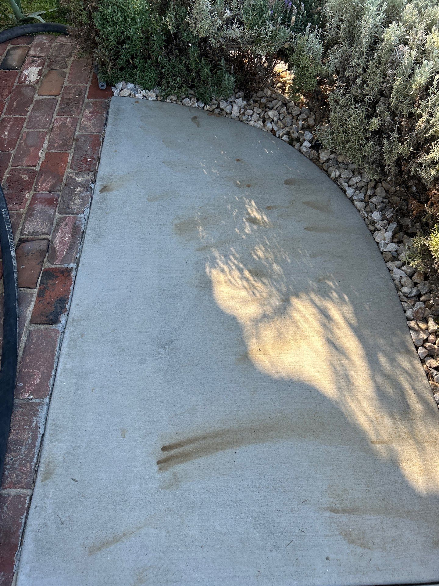 Sandblasting Paint Off Concrete Driveway In Downey, CA by La Power Washing Inc