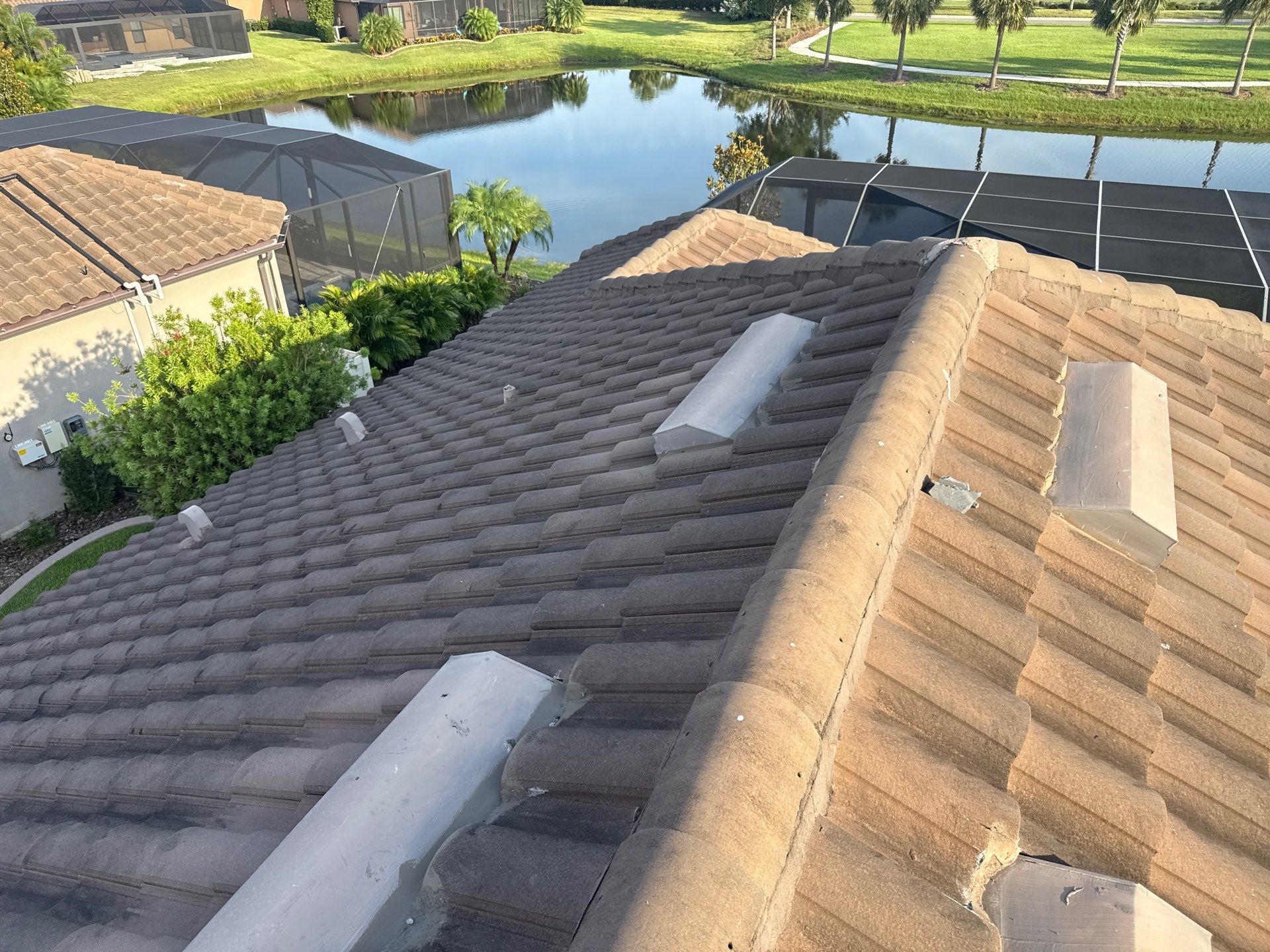Soft Wash Roof Cleaning – Concrete Tile Roof | Artisan Lakes Esplanade, Palmetto, FL by Sunshine AquaWash
