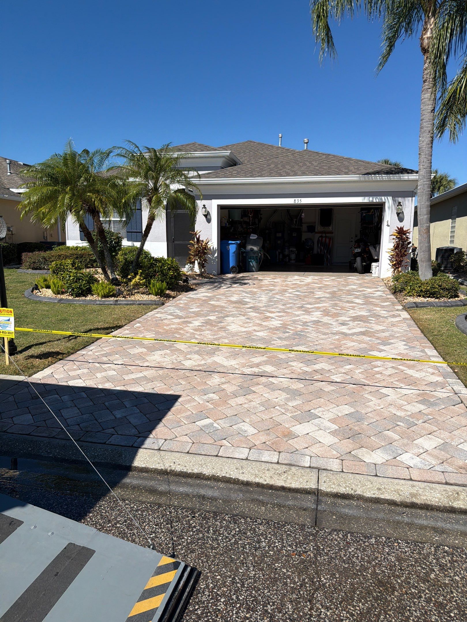 Herringbone Paver Driveway Repair, Stripping and Sealing in Sun City Center by Supreme Paver Experts
