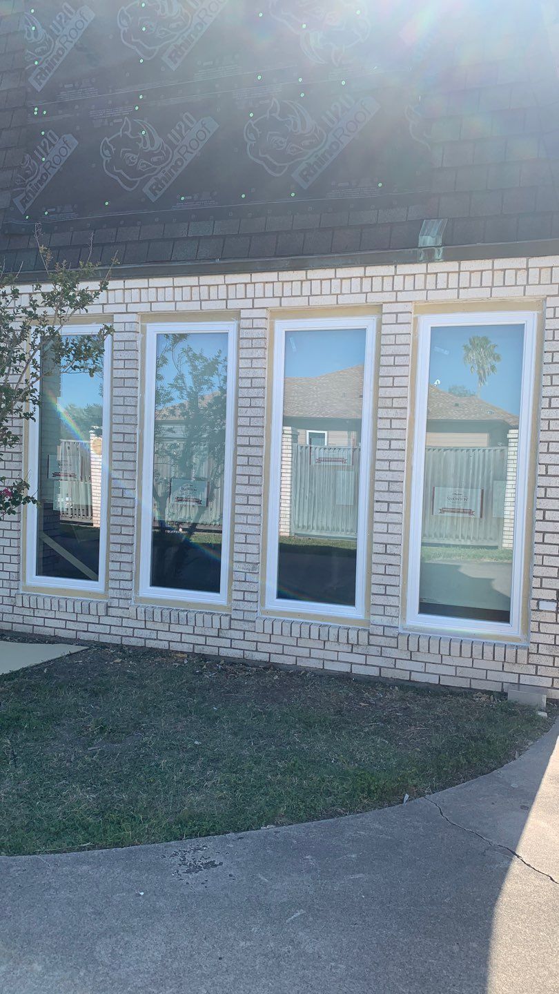 Mansard Charm by Bayfront Roofing and Construction