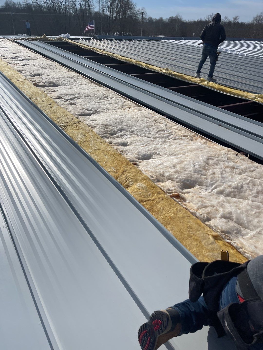 Commercial Roofing Installation using 24 Guage Double Lock Standing Seam by CentiMark Roofing