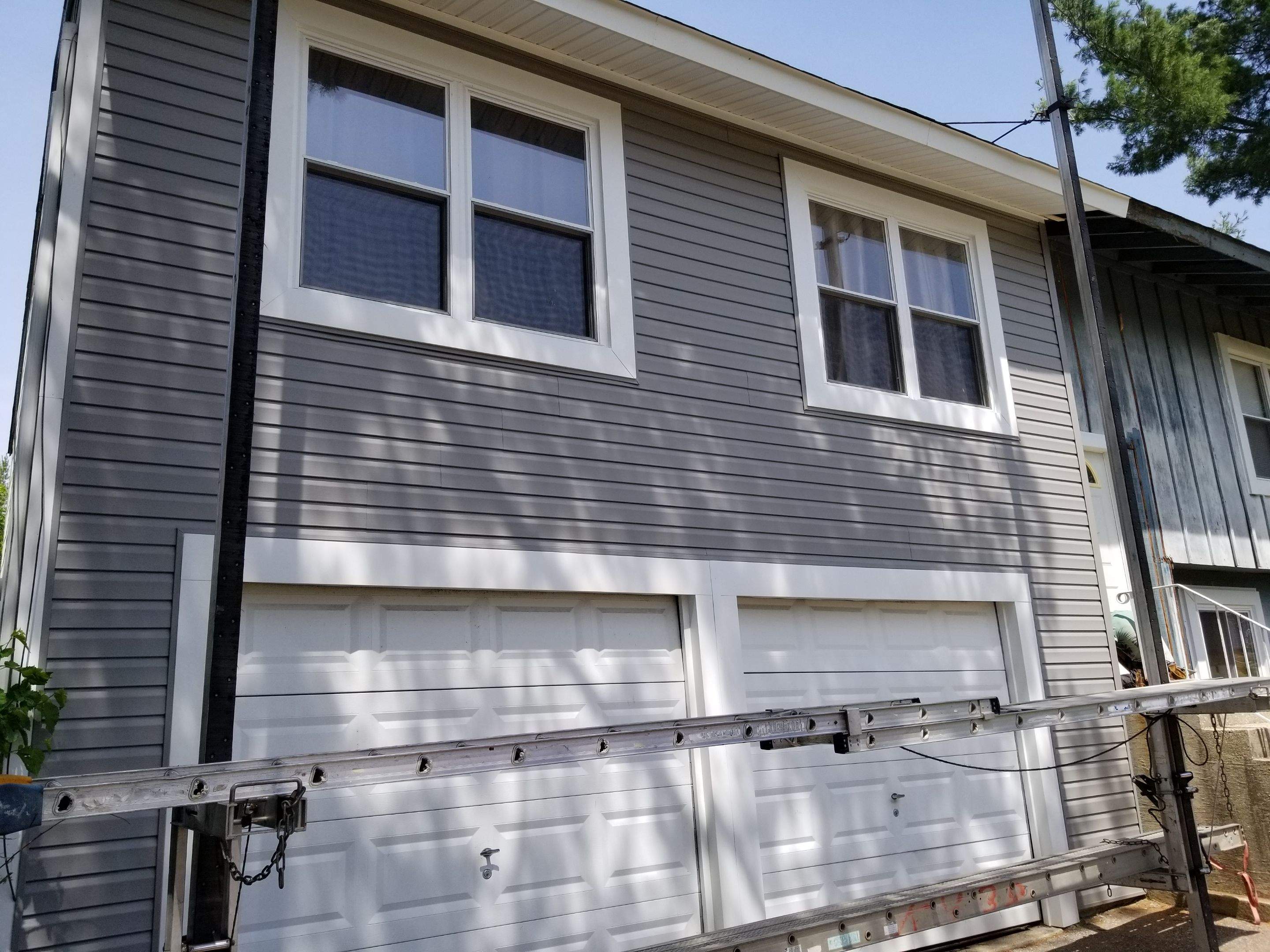 New Roofing, Siding, Railing and Gutters by Stofan Construction LLC