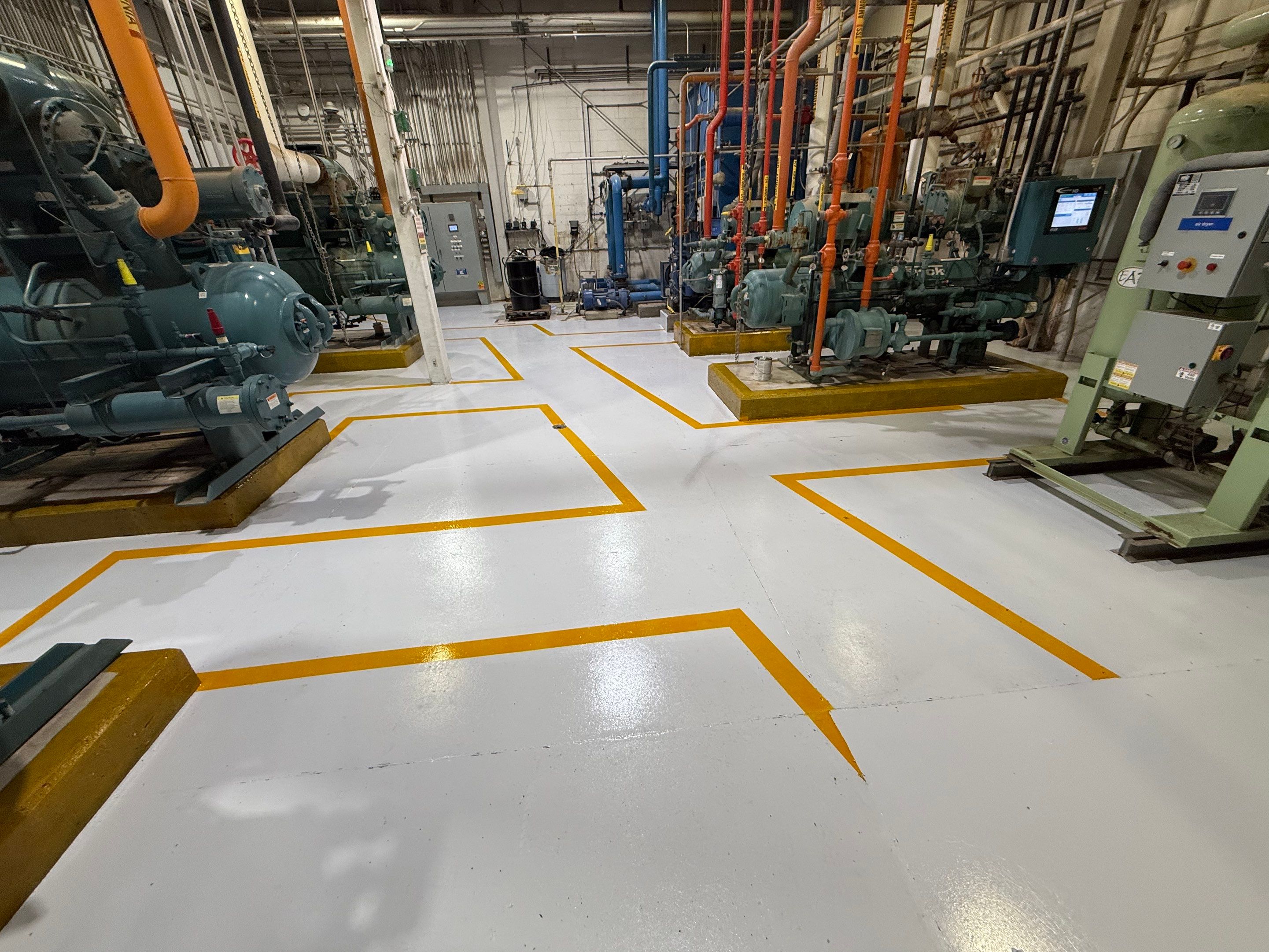Industrial Epoxy Floor Coating for Perdue Premium Meat Co in Sioux Center by Select Painting, Coatings & Garage Cabinets