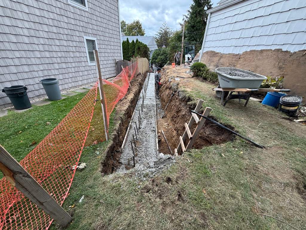 Concrete Retaining Wall Construction in Port Washington by Medina Design & Development Group