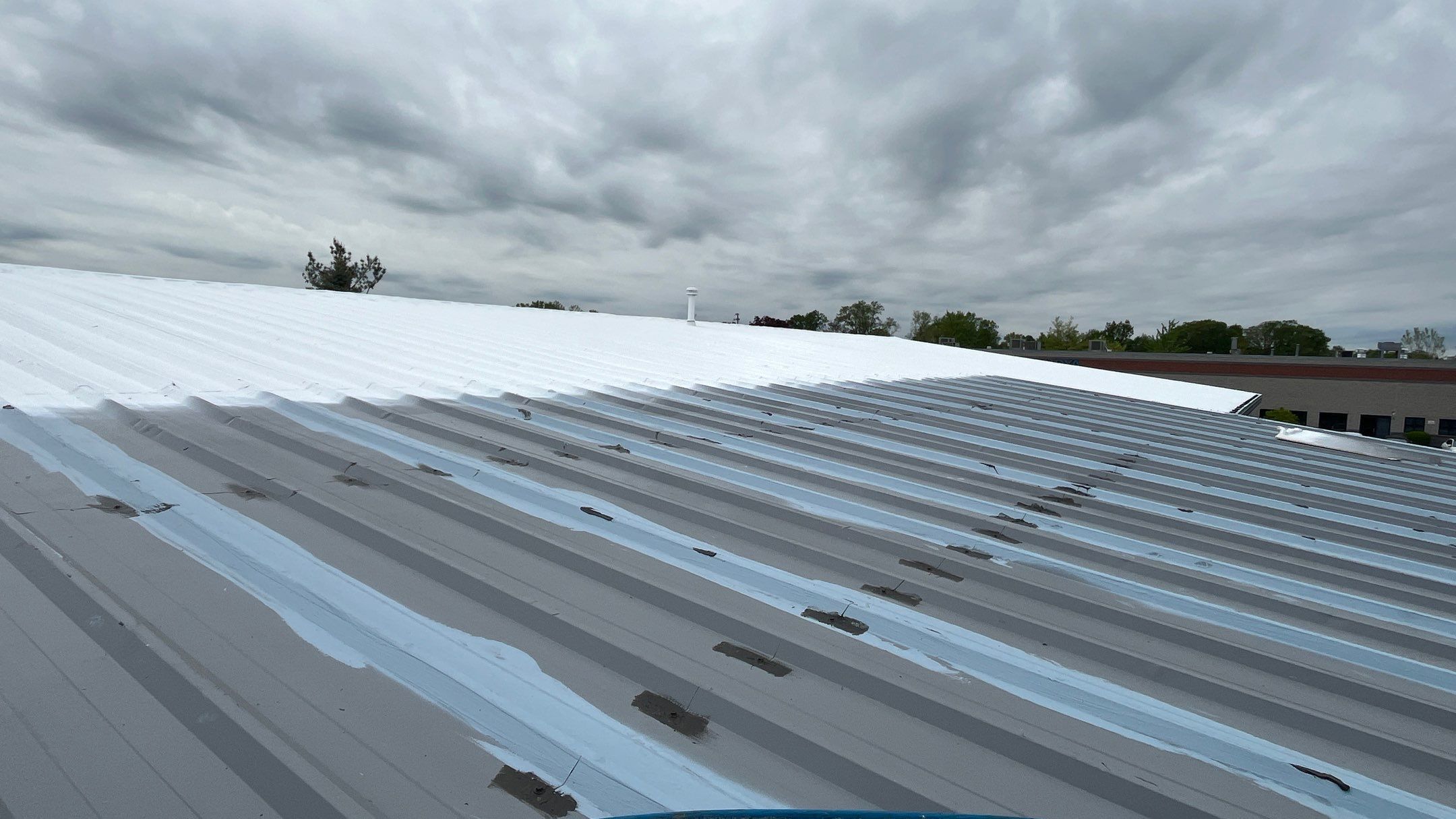 Berea Ohio Metal Roof Coating by Gold Star Roofing LLC 