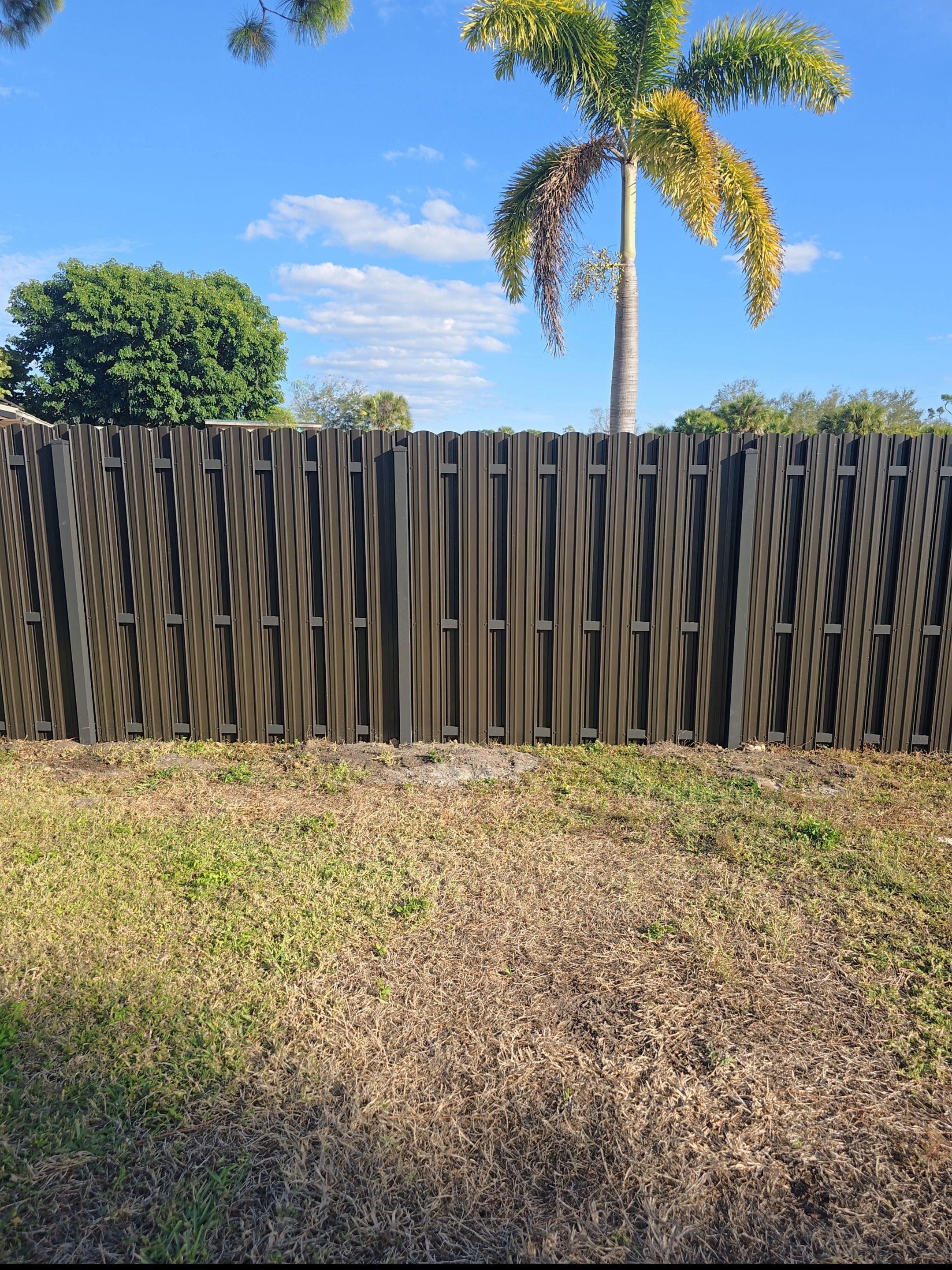 Bronze Metal Privacy Fence in Port Charlotte by True Fence LLC