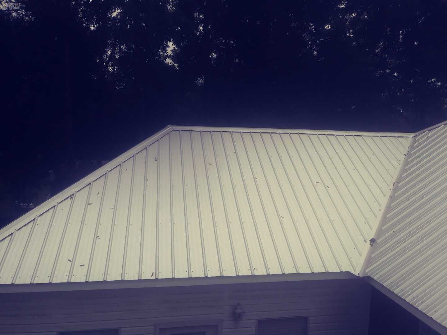 Residential Roofing Installation using Metal roofing by American Roofing & Construction LLC