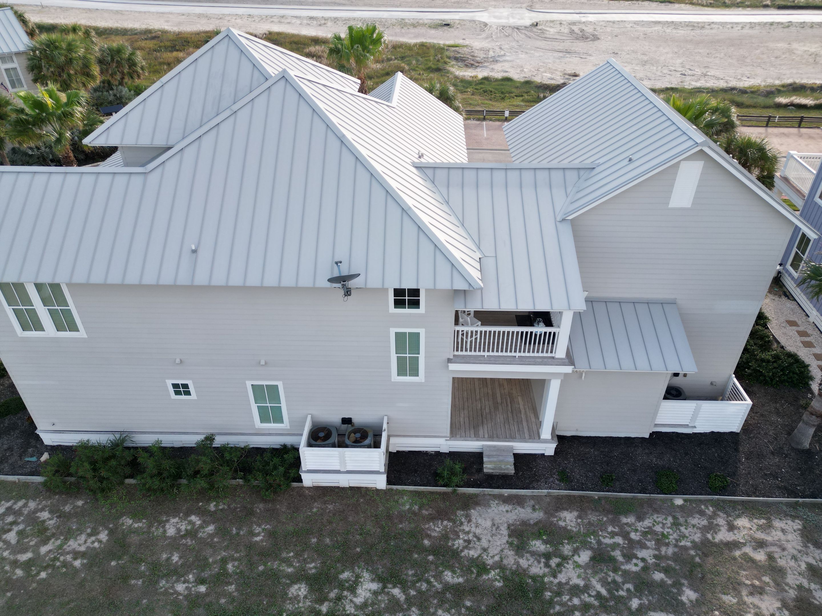 Residential Roof Replacement using 24 GA Double-Lock - Match Dove Grey by Action Exteriors Austin